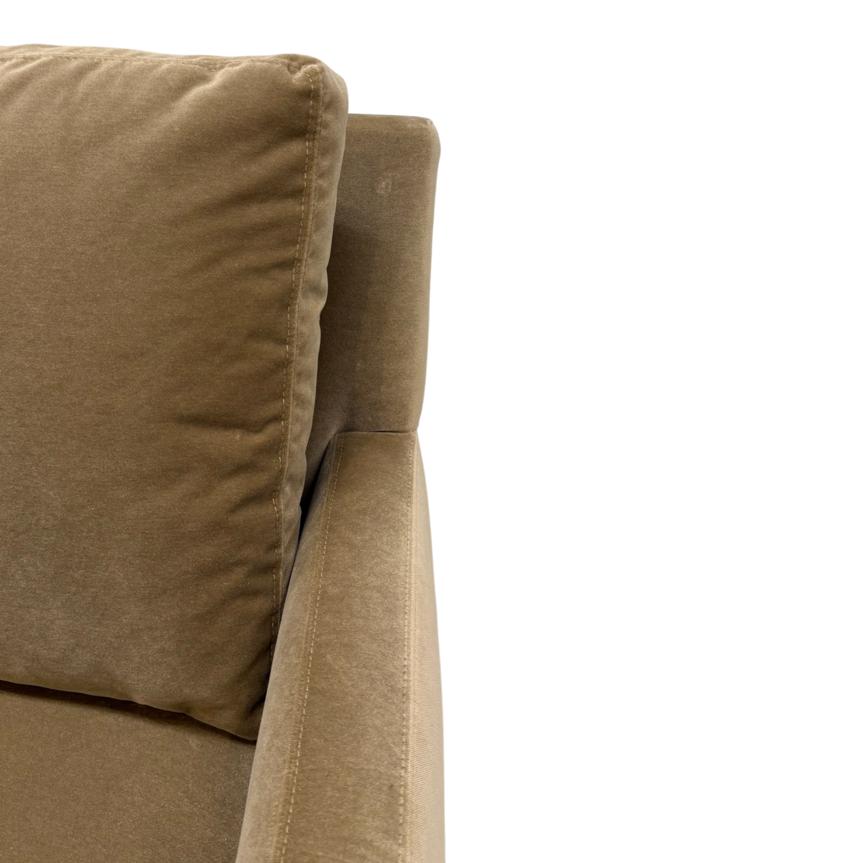 Close-up of the Weston Swivel Chair showing the plush back cushion, slim track arm and soft Winthrop Caramel upholstery.