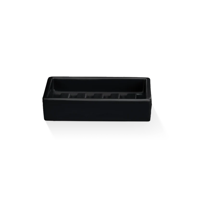Porcelain Soap Dish shown from the front in black glossy porcelain, highlighting the ridged interior base, raised rim, and rectangular silhouette.
