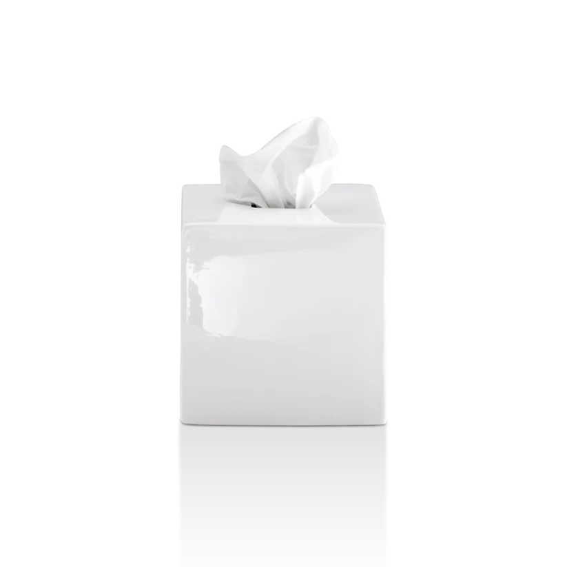 Porcelain Tissue Box shown from the front in white glossy porcelain, featuring a squared silhouette and cut top opening with tissue visible.