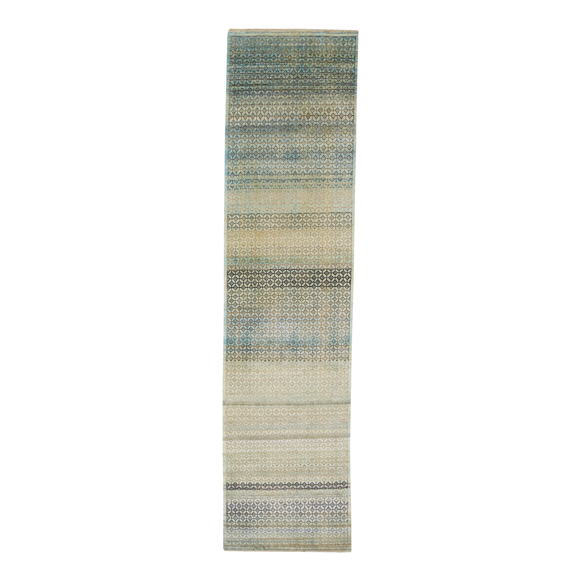 Designed to be passed through generations, the New Heirloom Rug Collection is crafted from recycled and upcycled wool, cocoon silk and sari silk.