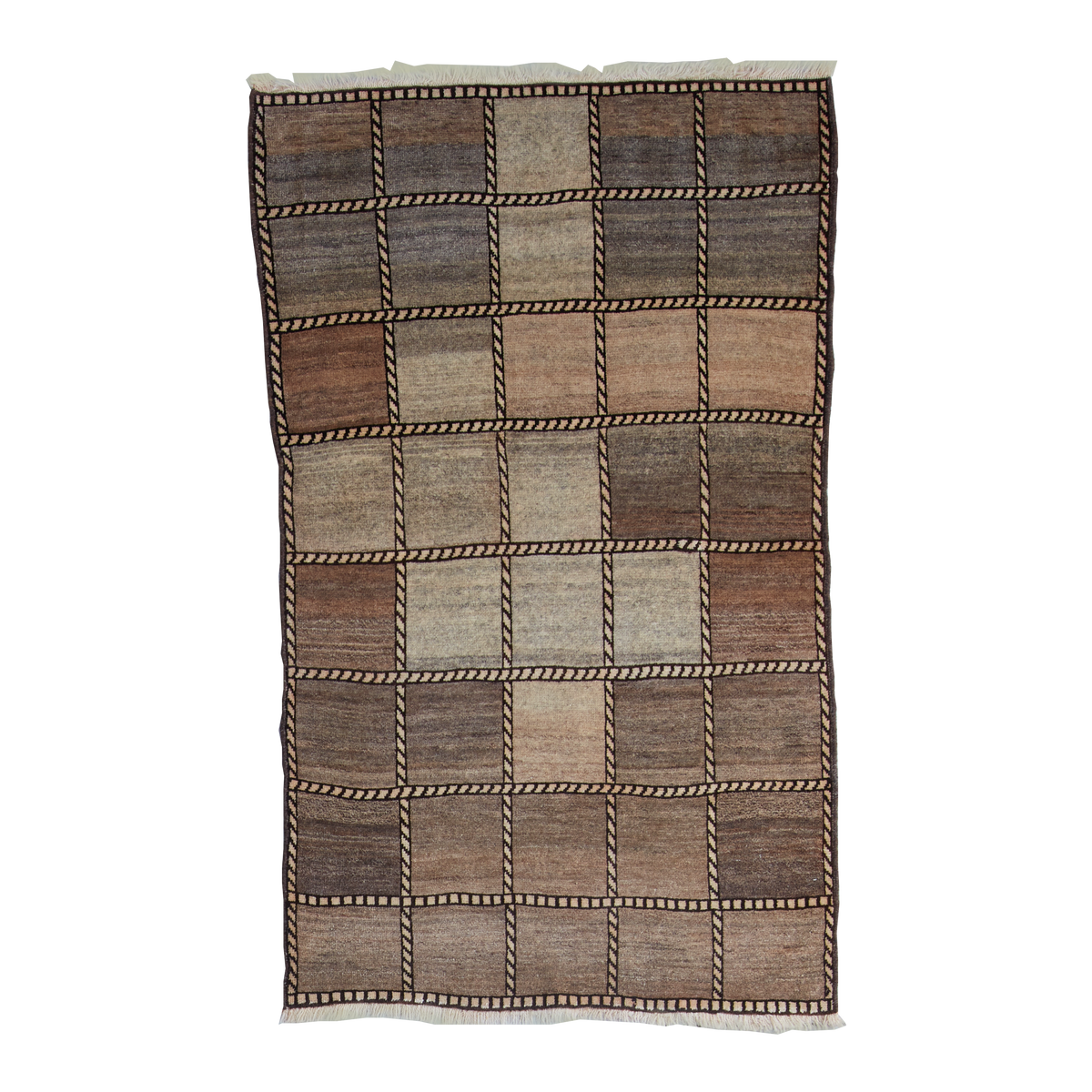 A rectangular hand-woven area rug with a patchwork grid design in earthy brown, beige, and gray tones, featuring a thick braided border and fringe on the top and bottom edges.