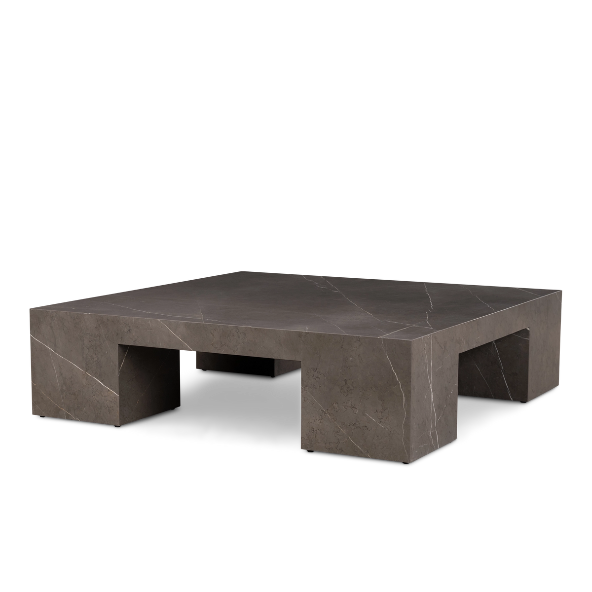 Duvall Coffee Table in warm gray Petra Grey marble, angled low to show the open sides beneath its slab top and veining carried down each leg.