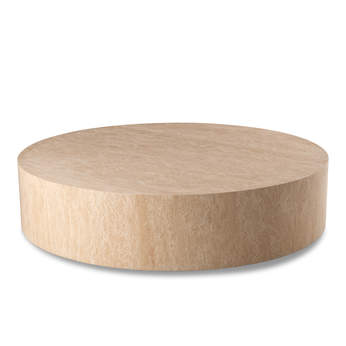 Meta Round Coffee Table shown in an angled view in Warm Beige travertine, highlighting the honed top and the vertical veining running down the curved side.