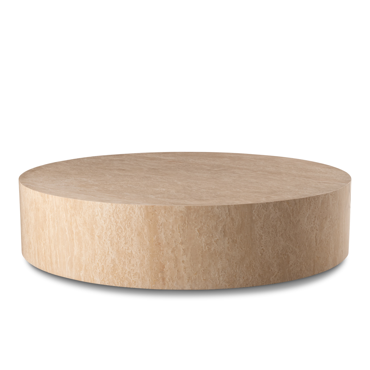 Meta Round Coffee Table in Warm Beige travertine from a slightly lower angle, showing the full drum profile and the soft cream mottling along the side.