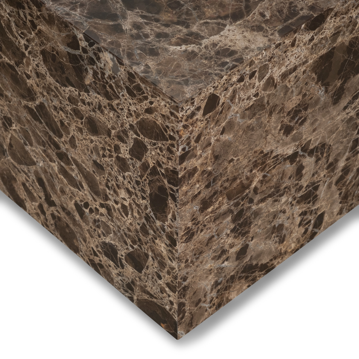 Close-up showing the corner of the Meta Rectangular Coffee Table in Chocolate Brown Dark Emperador marble, with crisp edges meeting at a clean, continuous vein pattern.