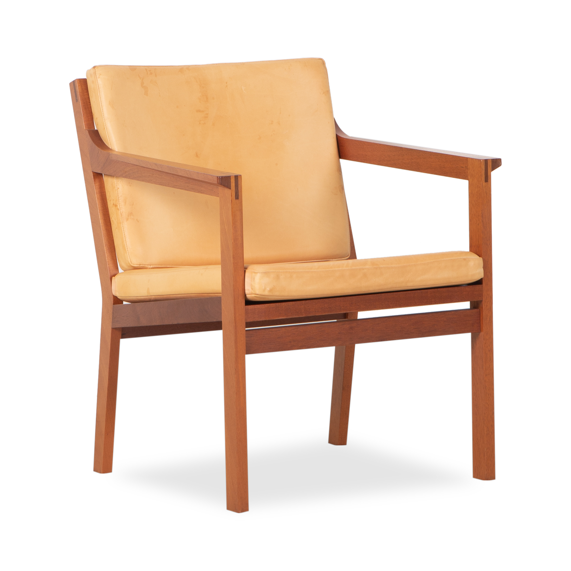 Clean and elegant, this vintage leather armchair was designed by Christian Hvidt for Soborg Mobler, circa 1980s.