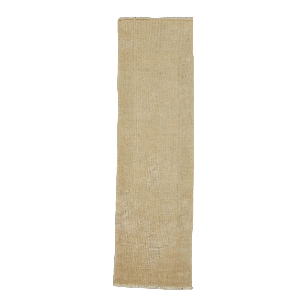 A long, narrow rectangular rug in a light beige or sandy tan color, shown flat against a solid white background.