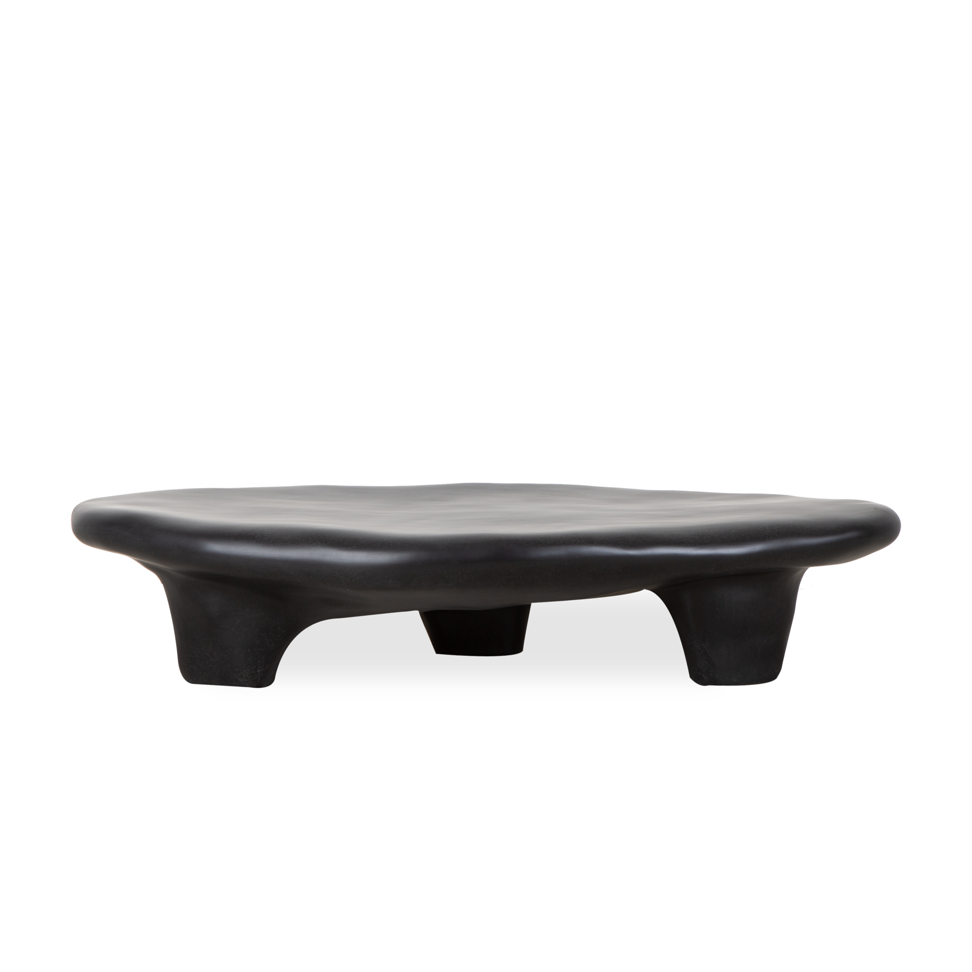 Inspired by three-legged ancient artifacts, the Tripod Low Coffee Table's irregular structure celebrates organic textures and the ritual of creating objects with imperfect beauty.