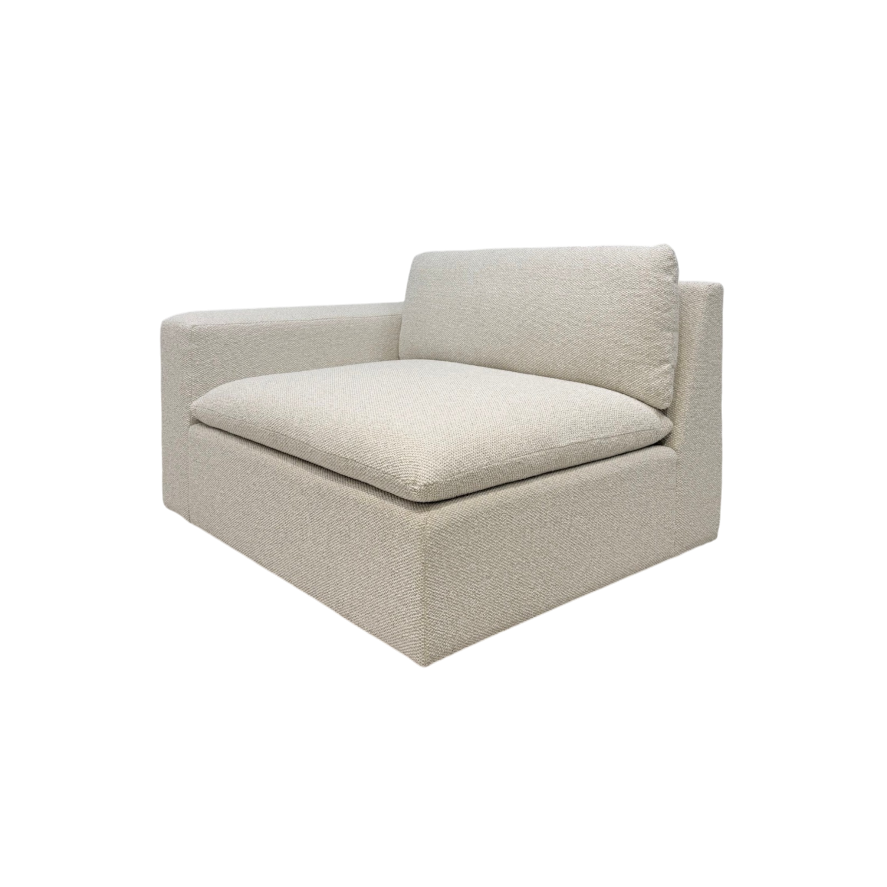 Tempo Modular LAF Chair in ivory textured upholstery, shown in an angled view with a low-profile frame, left arm, and oversized loose seat and back cushions.