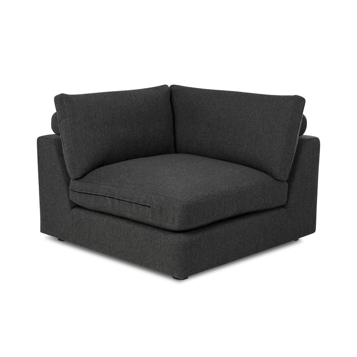 Angled view of the Colonna Modular Corner Chair in charcoal bouclé, showing the two back cushions meeting at the corner, the deep seat cushion, and the low round feet beneath the base.