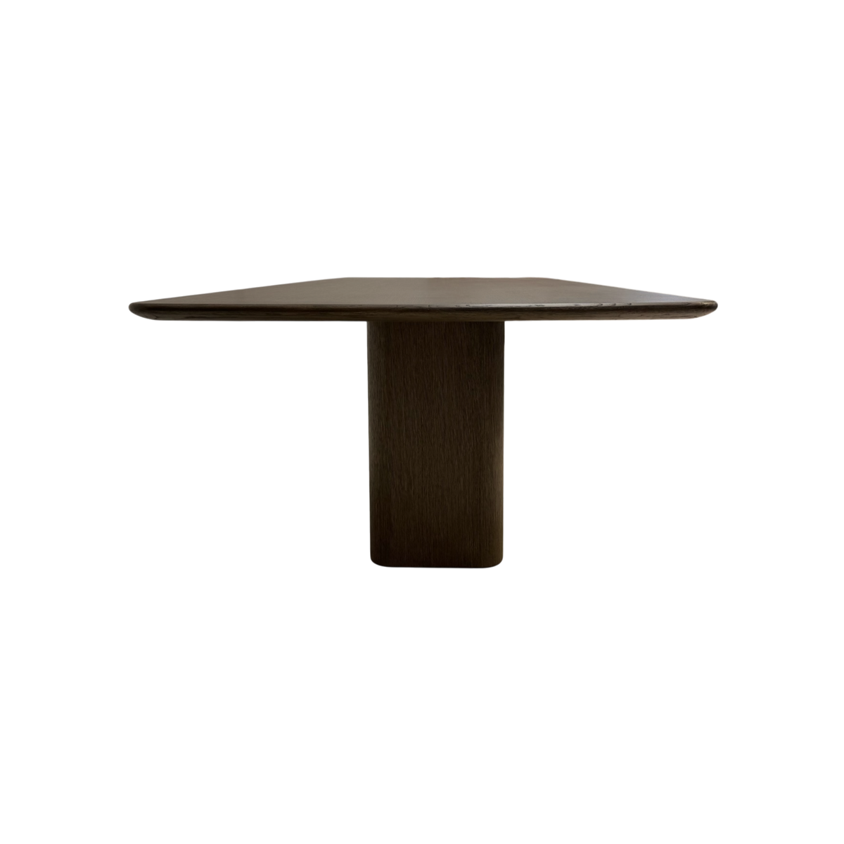 Side view of the Altar 120-inch Dining Table highlighting the cantilevered tabletop, rounded profile and solid central wood pedestal.