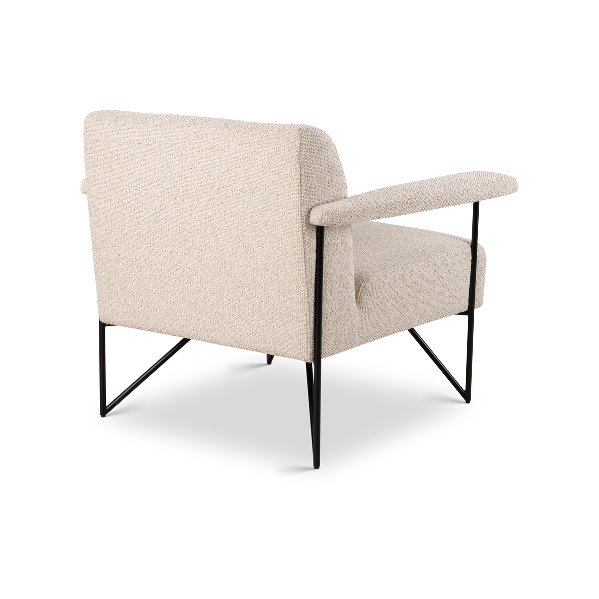 Knox Lounge Chair angled from the back in oatmeal fabric, showing the smooth upholstered back panel, slim arm, and crossed black metal base.
