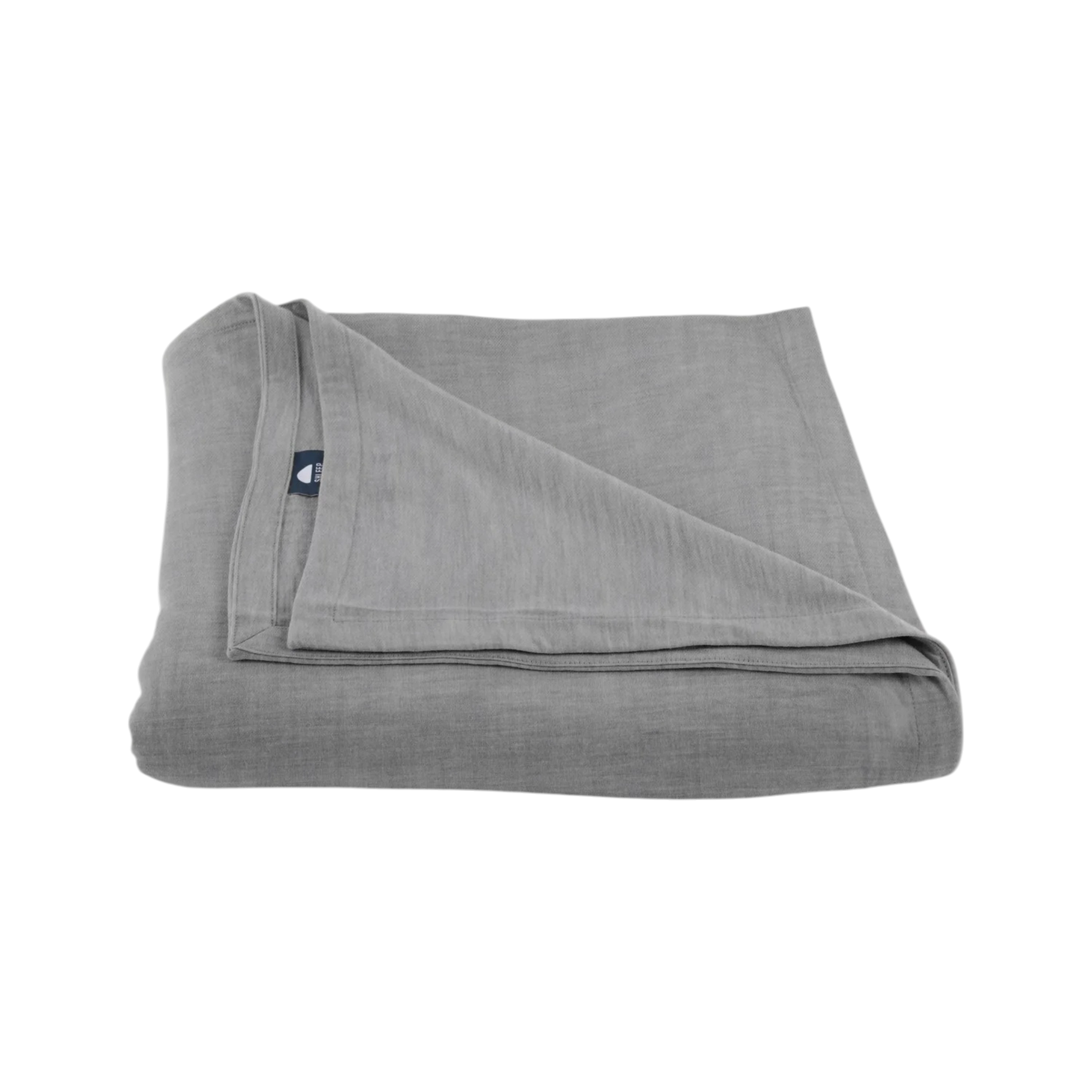 Merino Flat Sheet King in Granite grey Merino Jersey, folded to show the soft drape, double-layered top edge and stitched finish.