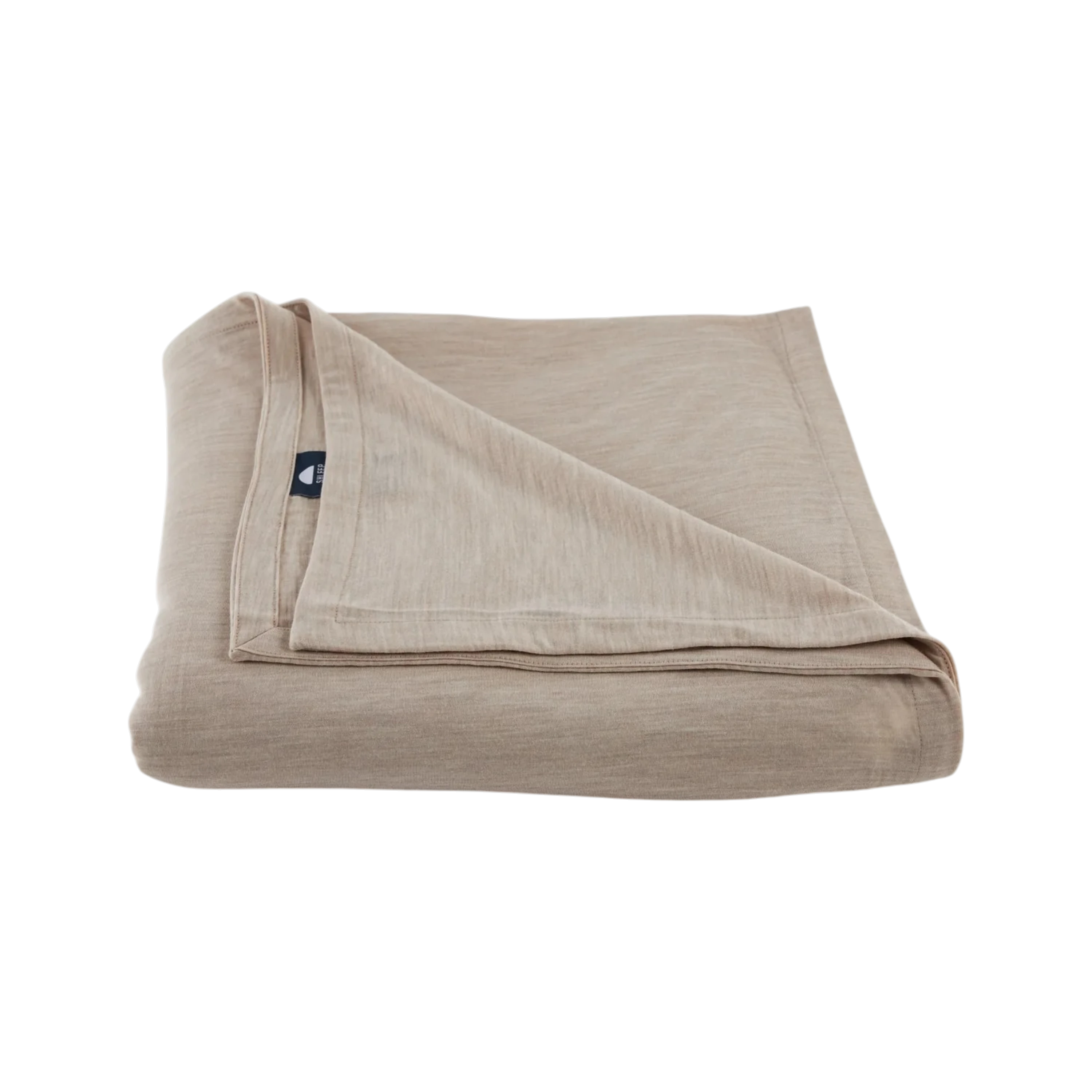 Merino Flat Sheet King in Sand Merino Jersey, folded to show the soft drape, double-layered top edge and stitched finish.
