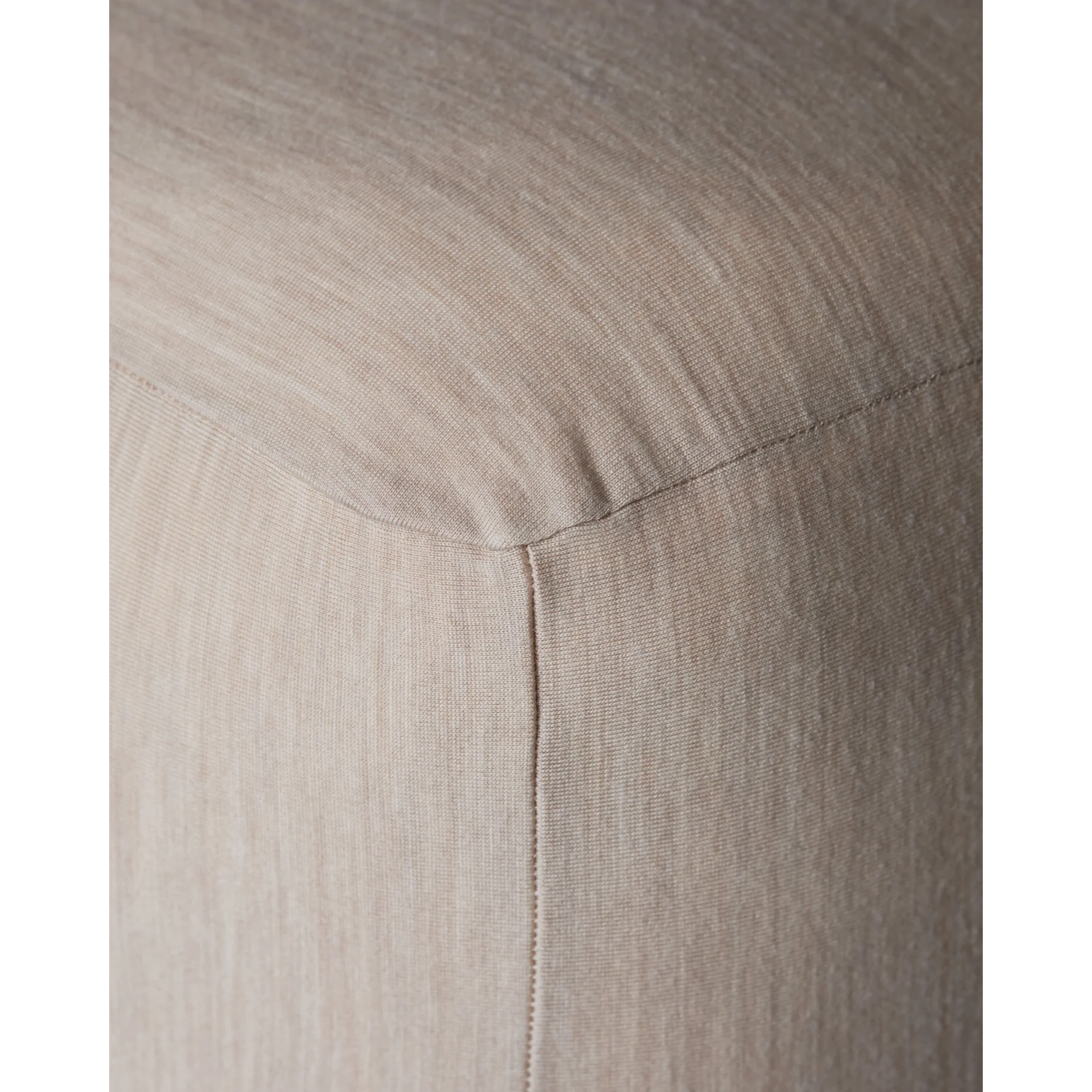 Close-up of Merino Fit Sheet Queen in Ivory showing the smooth jersey texture, fitted corner and tailored seam detail.