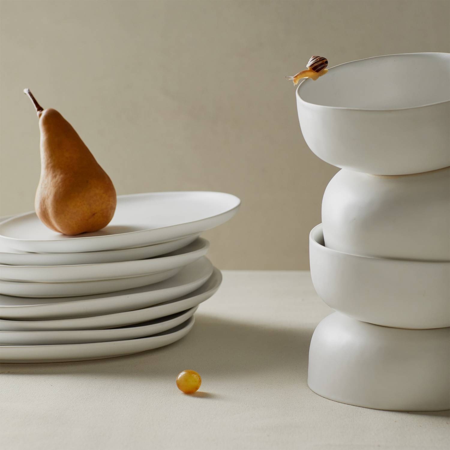 Crafted in Portugal for Elte, the Organic Dinnerware Collection is characterized by its soft, organic curves and matte glaze.