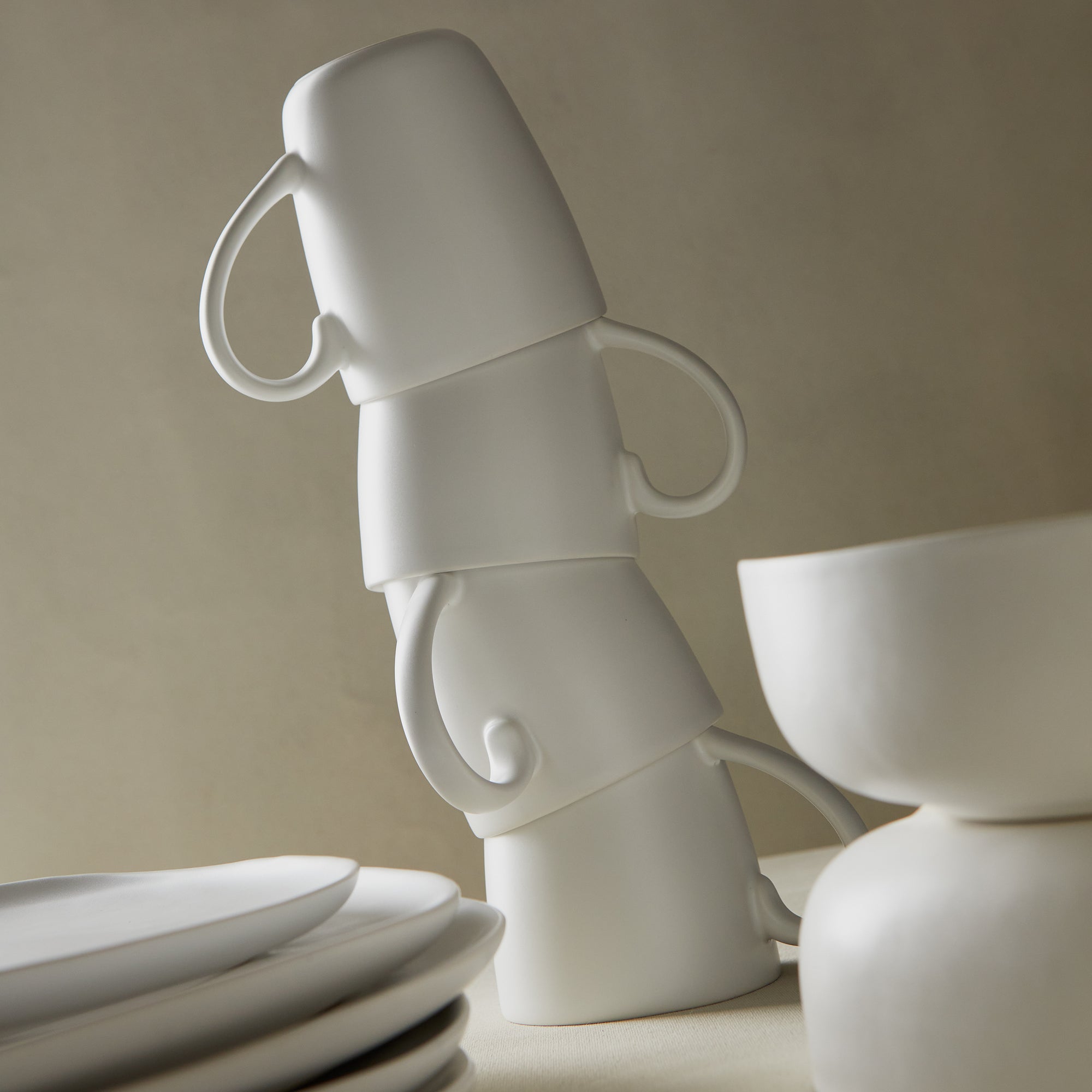 Crafted in Portugal for Elte, the Organic Dinnerware Collection is characterized by its soft, organic curves and matte glaze.