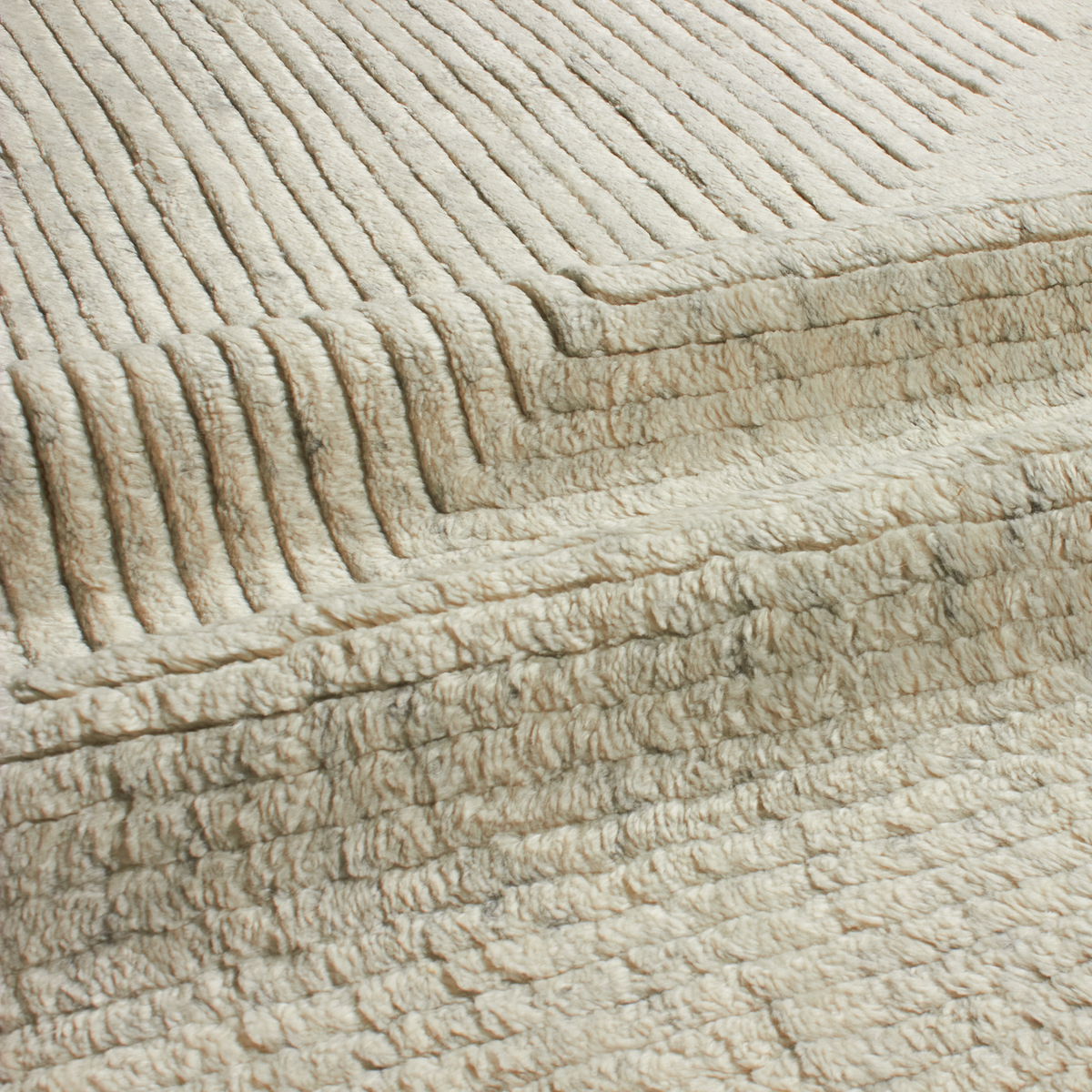 An homage to the quintessential Moroccan rug, ancient patterns are reimagined as bold, geometric forms.