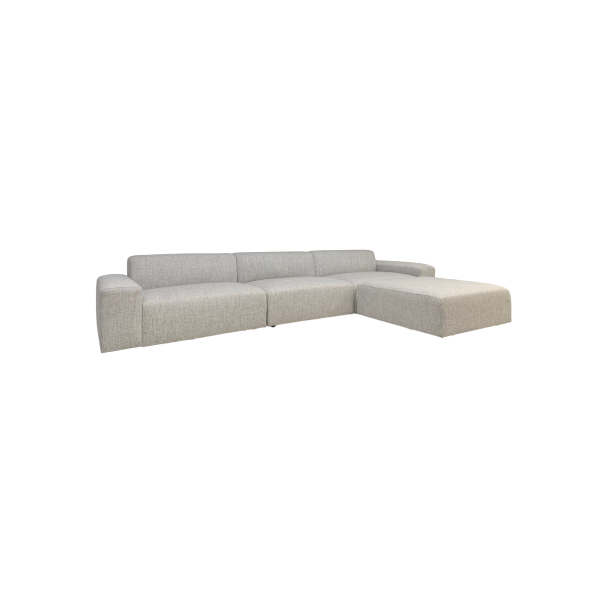Vetro Bullnose Sectional in light woven grey upholstery, angled front view highlighting the wide seats, squared arms and extended chaise.