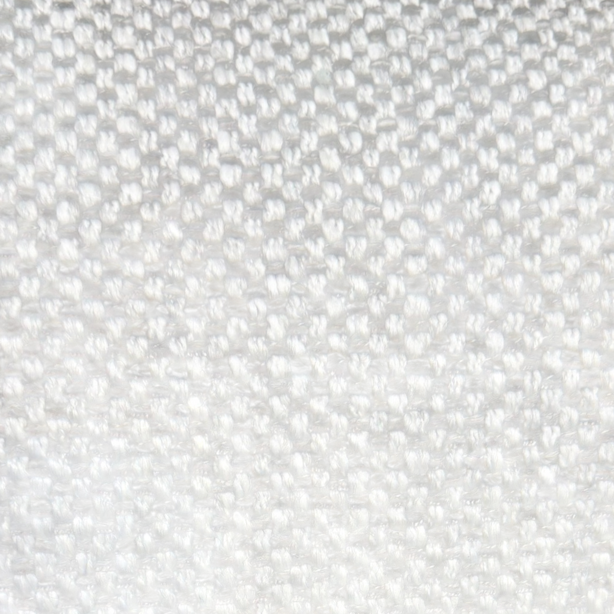 Close-up of Vetro Bullnose Sectional light grey upholstery showing the tightly woven fabric texture.