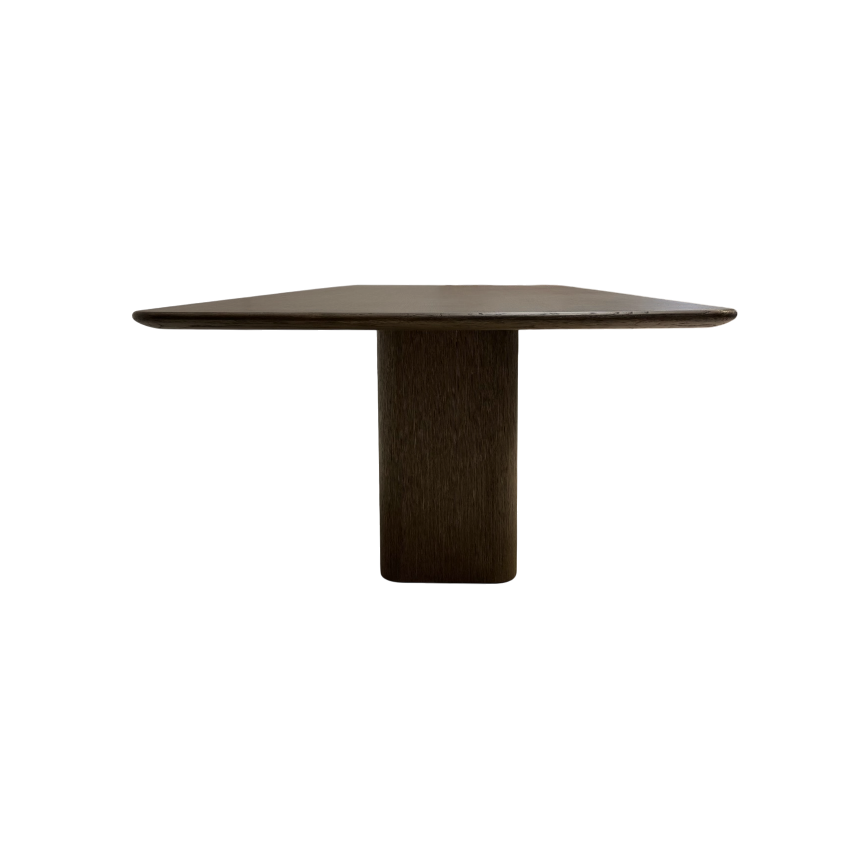 Side view of the Altar Dining Table highlighting the cantilevered tabletop, rounded profile and solid central wood pedestal.