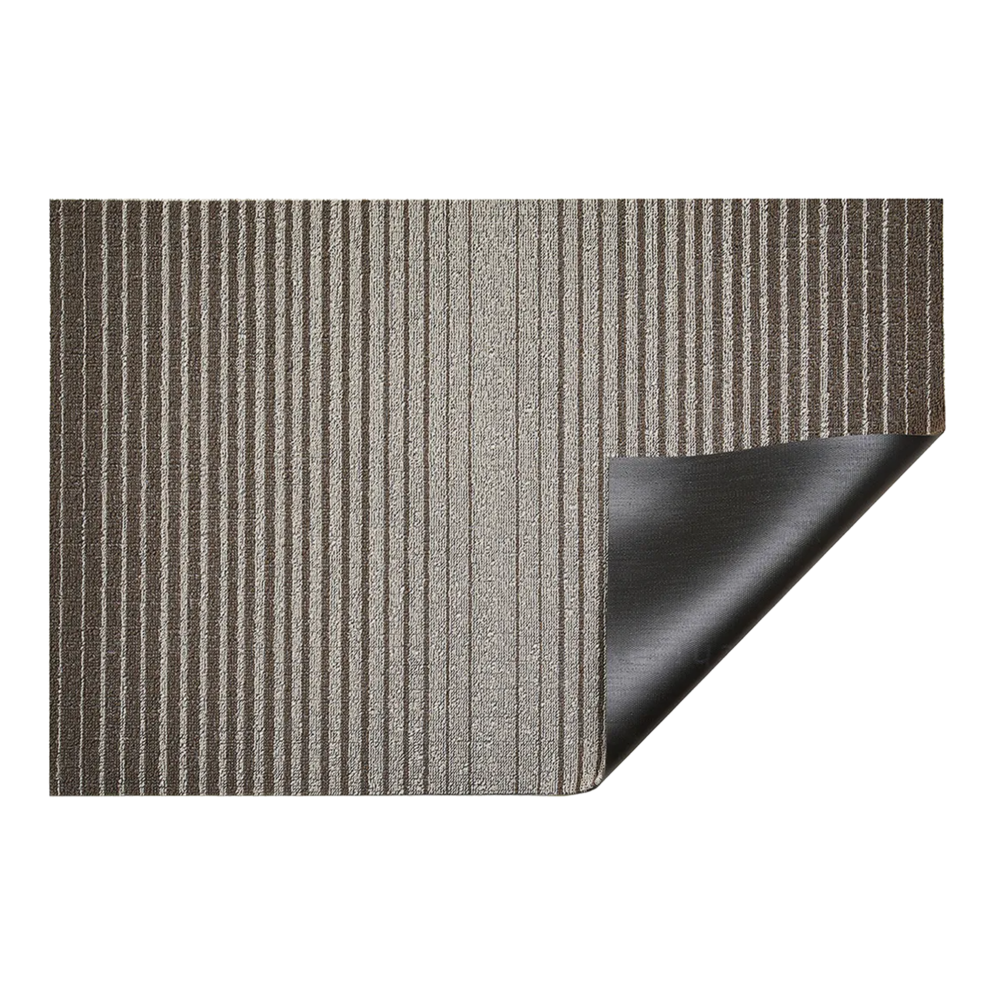 Inspired by the sharp contrast and mesmerizing motion of a cascading row of dominoes, the variegated stripes of this easy-care floor mat are at once dynamic and serene.