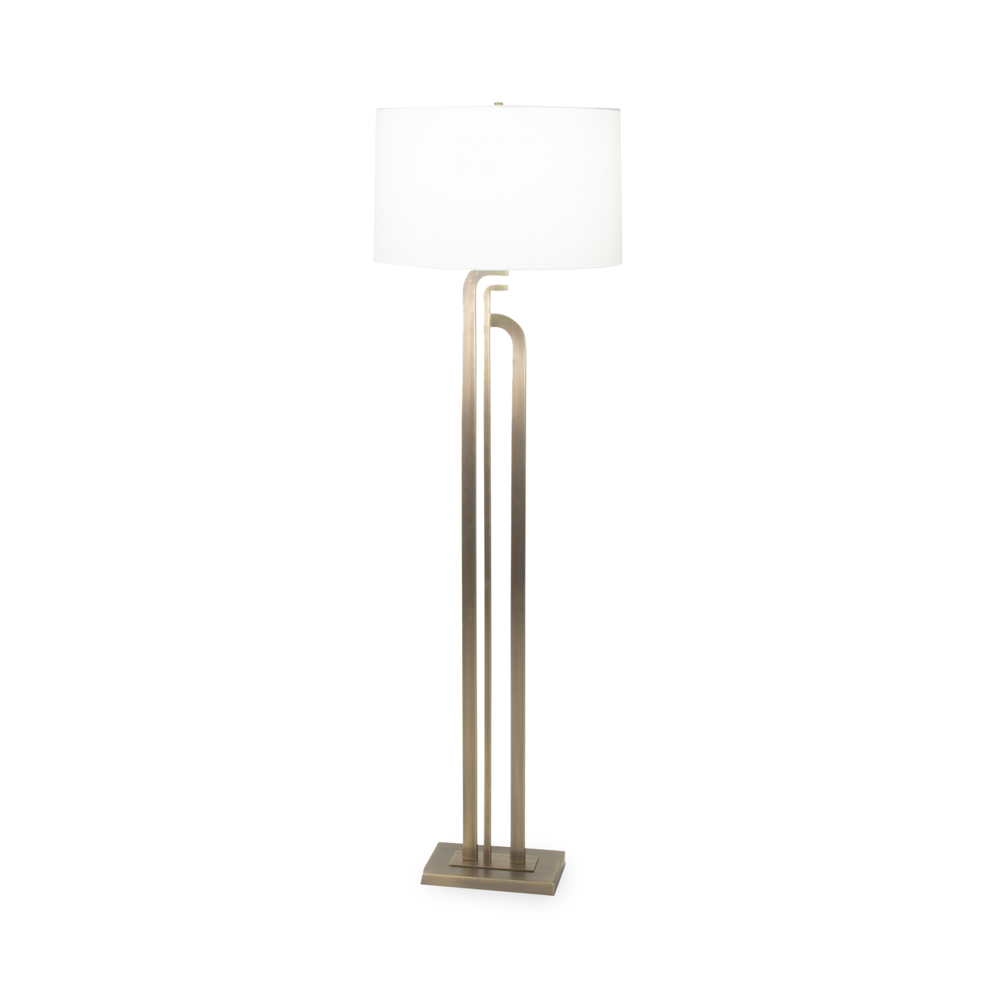 Long asymmetrical metal bands finished in antique brass lend a modern interpretation of Art Deco to the Draper floor lamp with their curved geometric forms.