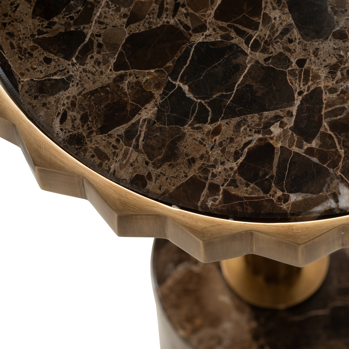 Close-up showing the faceted metal rim of the Mabel Pull Up Table’s dark brown marble top, with fine cream veining and tan fragments.