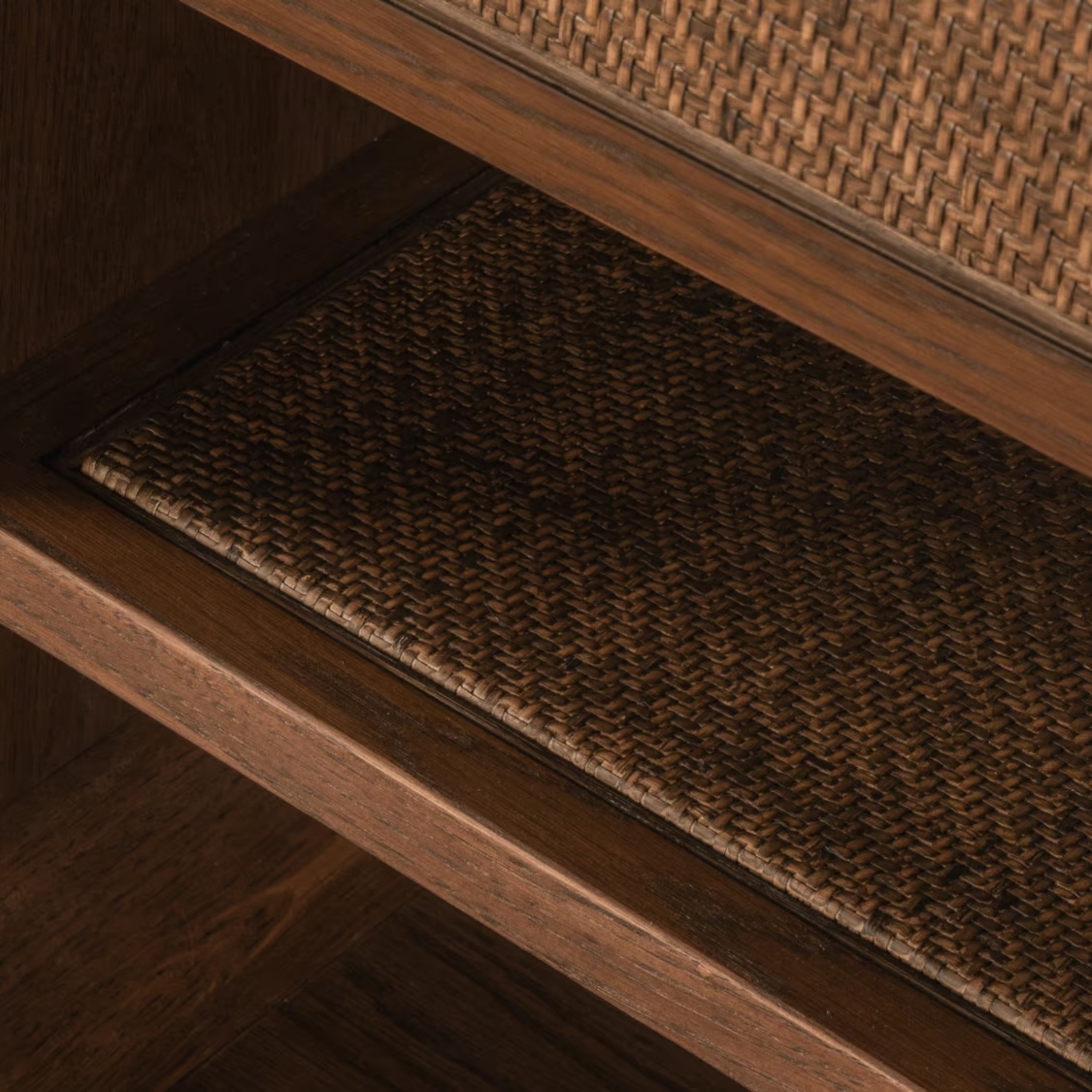 Cabo Nightstand close-up of woven open shelf and warm wood frame