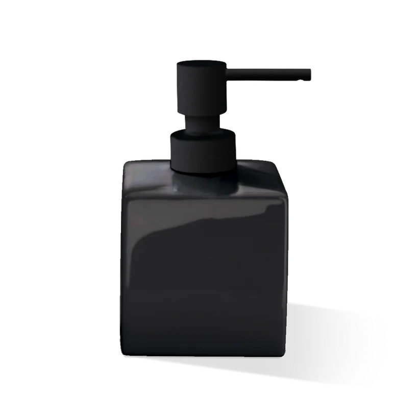 Porcelain Soap Dispenser shown from the front in black glossy porcelain, featuring a squared silhouette, matte black pump, and extended spout.