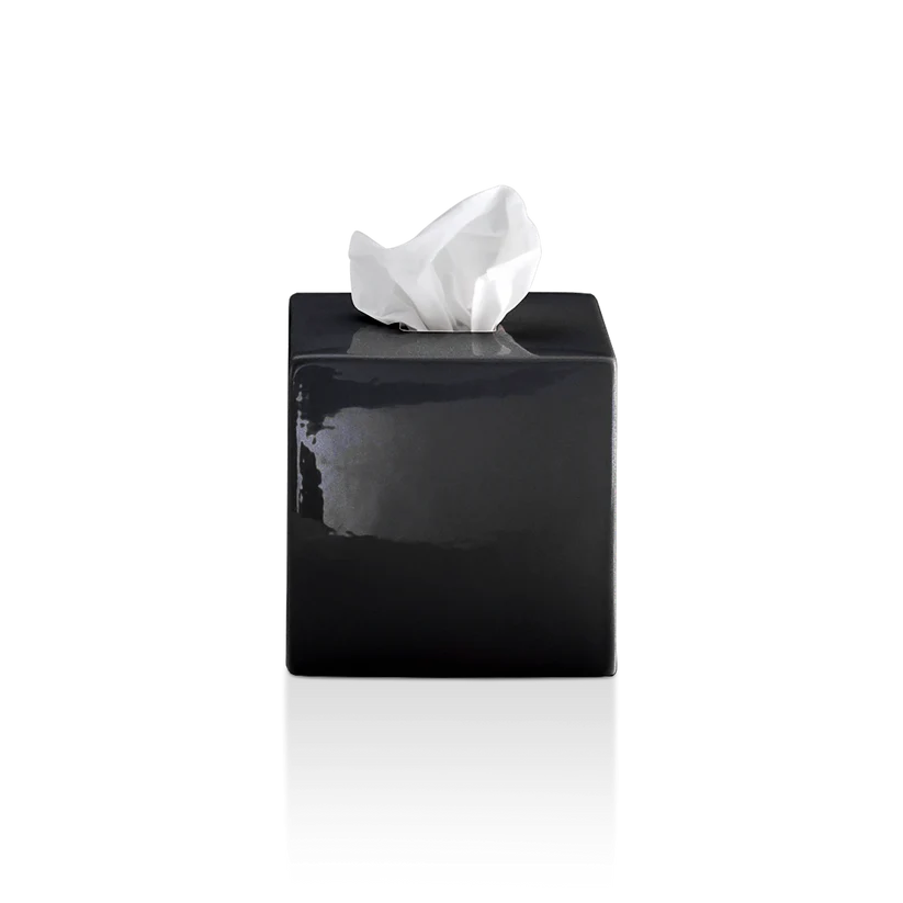 Porcelain Tissue Box shown from the front in black glossy porcelain, featuring a squared silhouette and cut top opening with tissue visible.