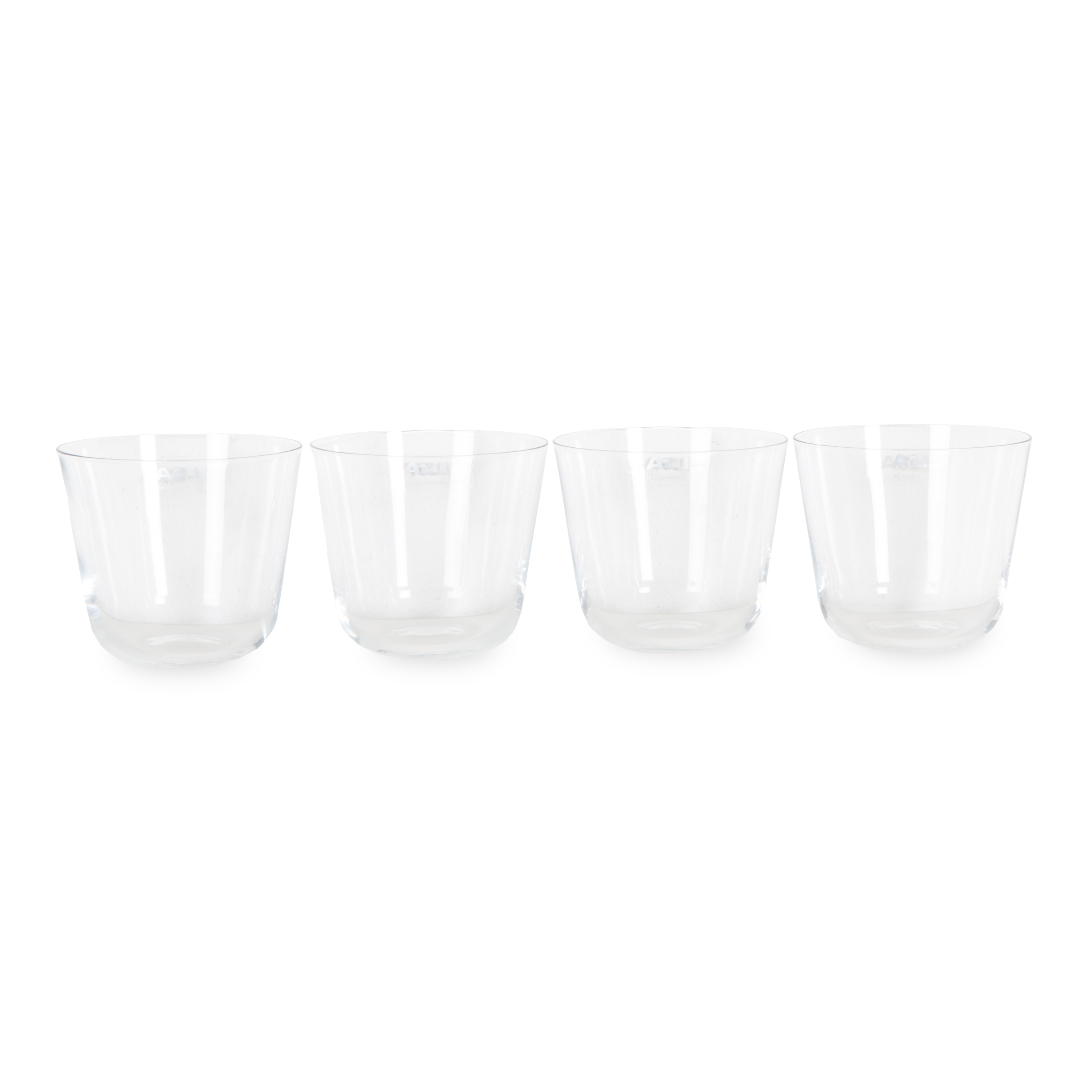 Elevating your glassware collection, the Arc Tumbler Glasses come in a set of four and features rounded bases and softly tapered profiles.