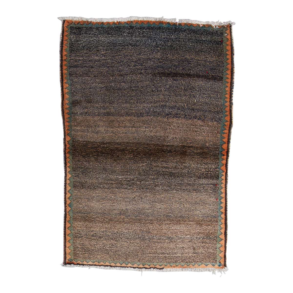 A rectangular woven rug with a dark brown and charcoal gray gradient center, a geometric orange and green border, and fringed edges, shown flat against a white background.