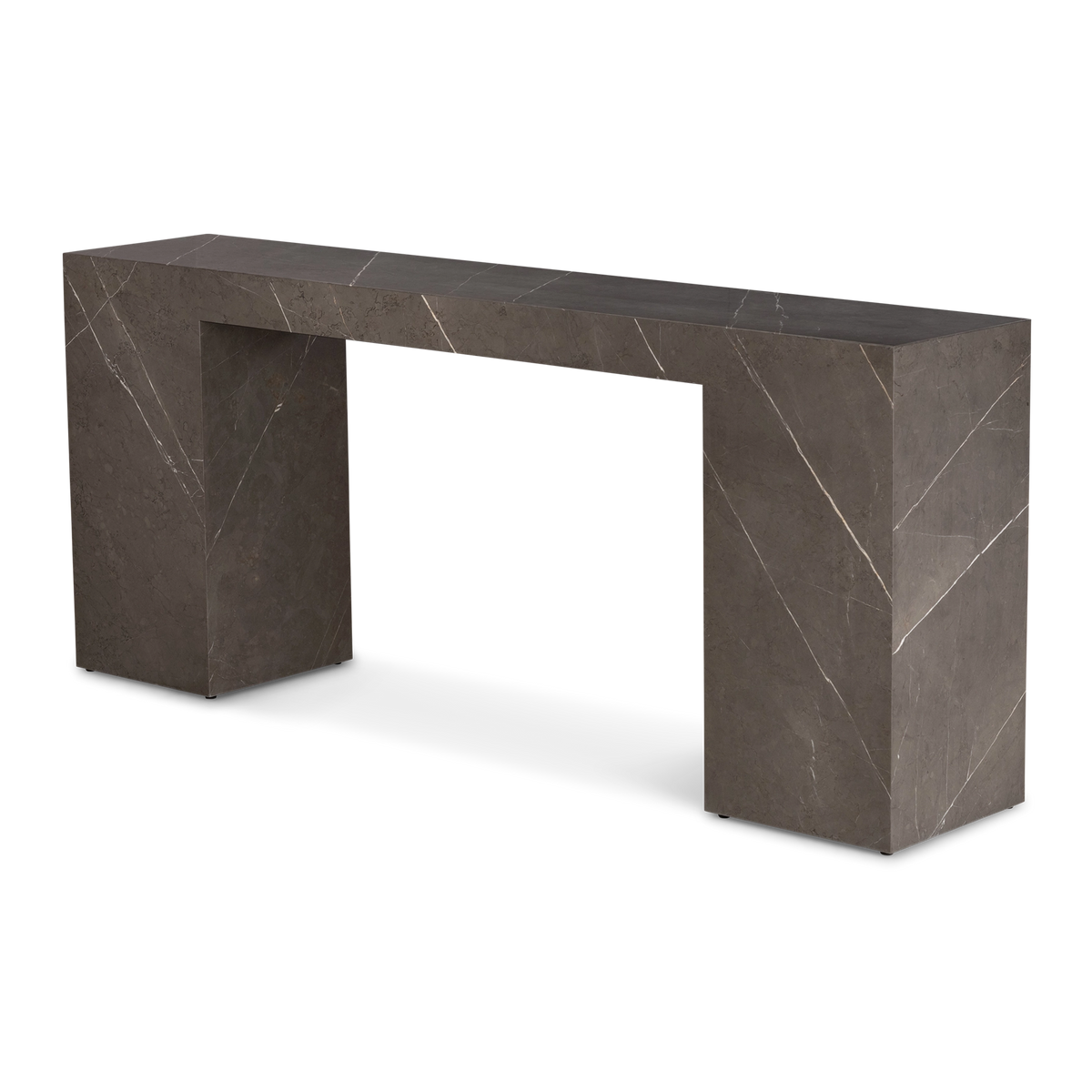 Duvall Console Table angled view in warm gray Petra Grey marble, highlighting its bridge-like silhouette and diagonal white veining across both block legs.