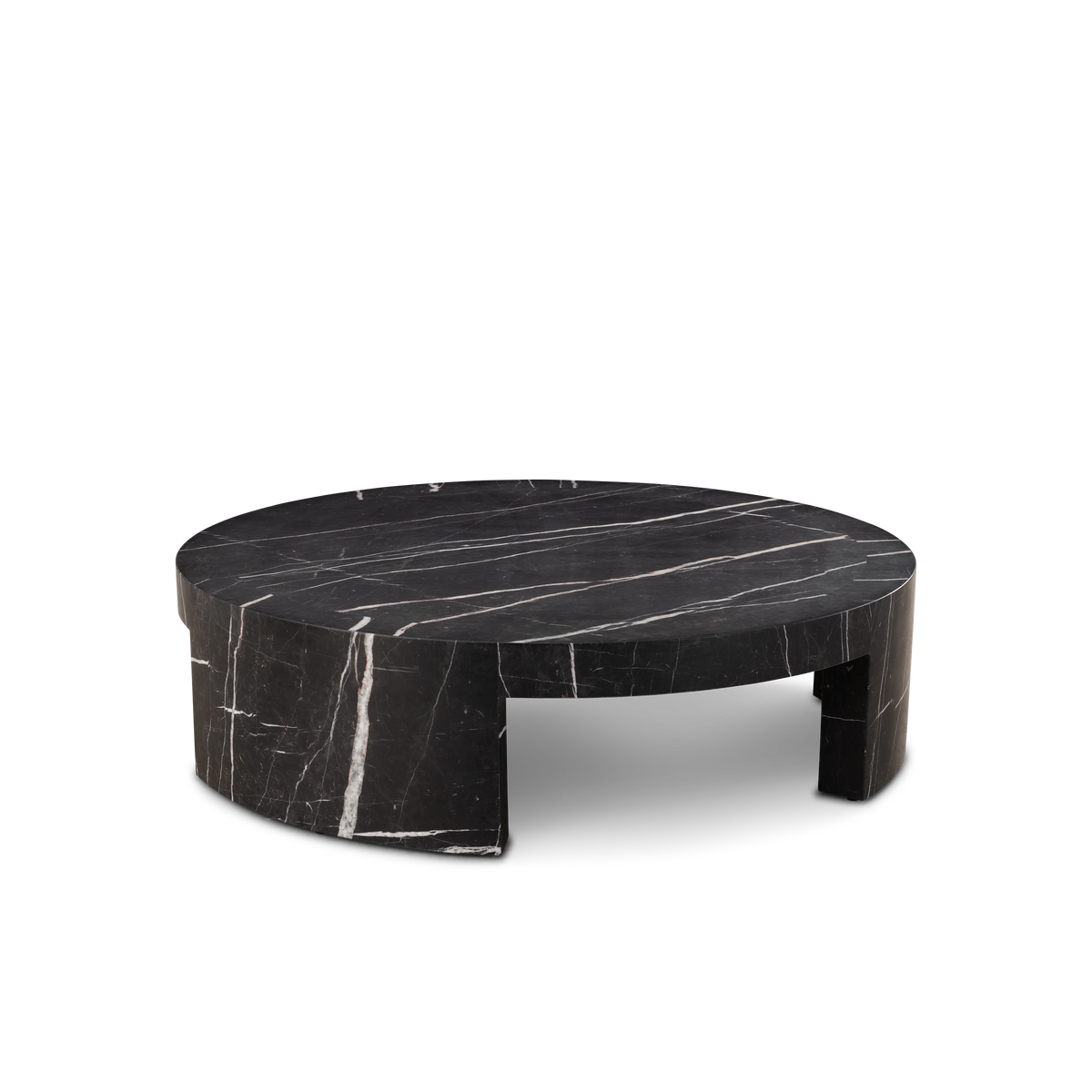 Shift Coffee Table shown from a slightly elevated angle in Black Nero Marquina marble, highlighting the round top, the long white veins, and the arched cut-out legs.