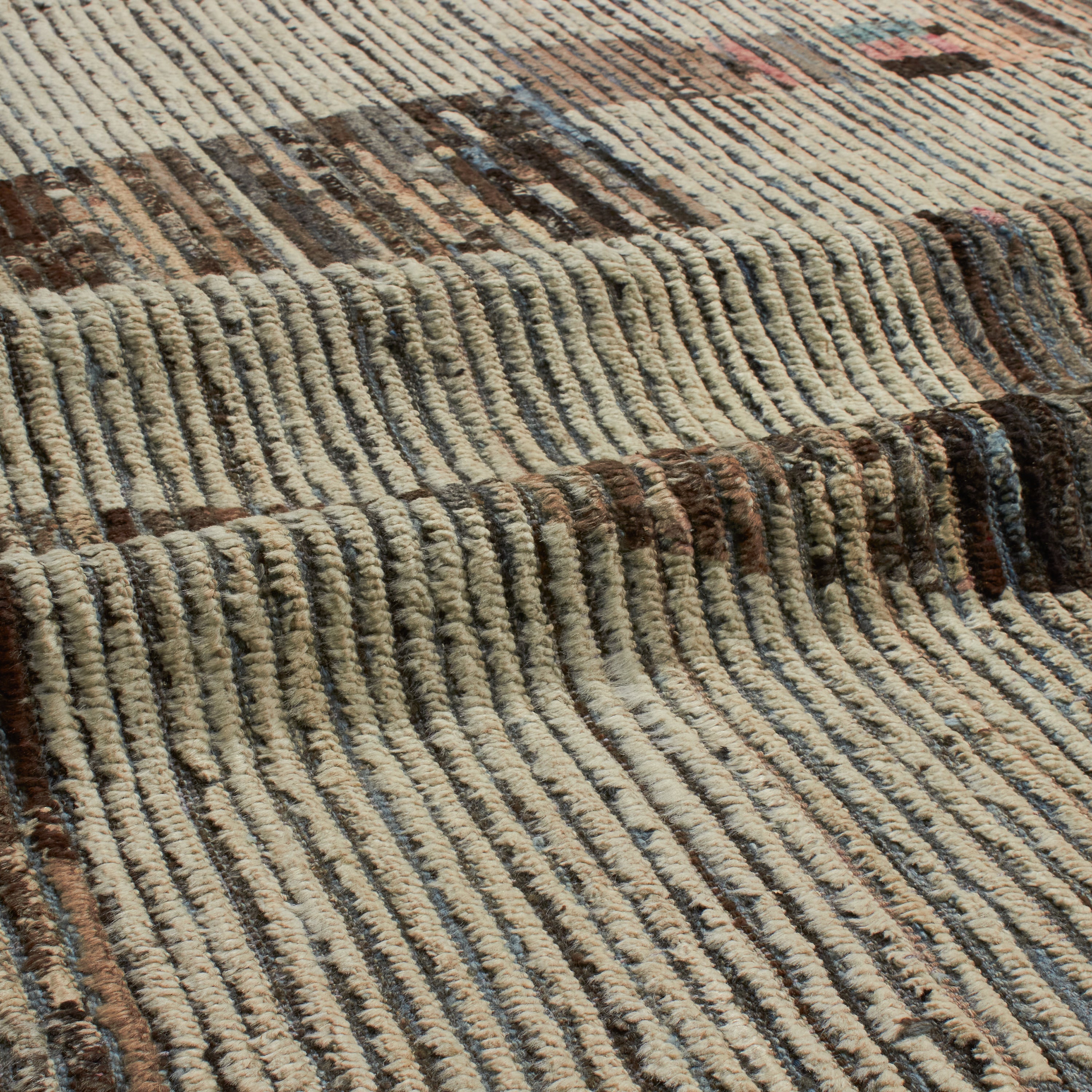 Revered for its lustre and soft hand, the natural qualities of wool from ancient Karakul sheep are honoured through restraint and refinement.