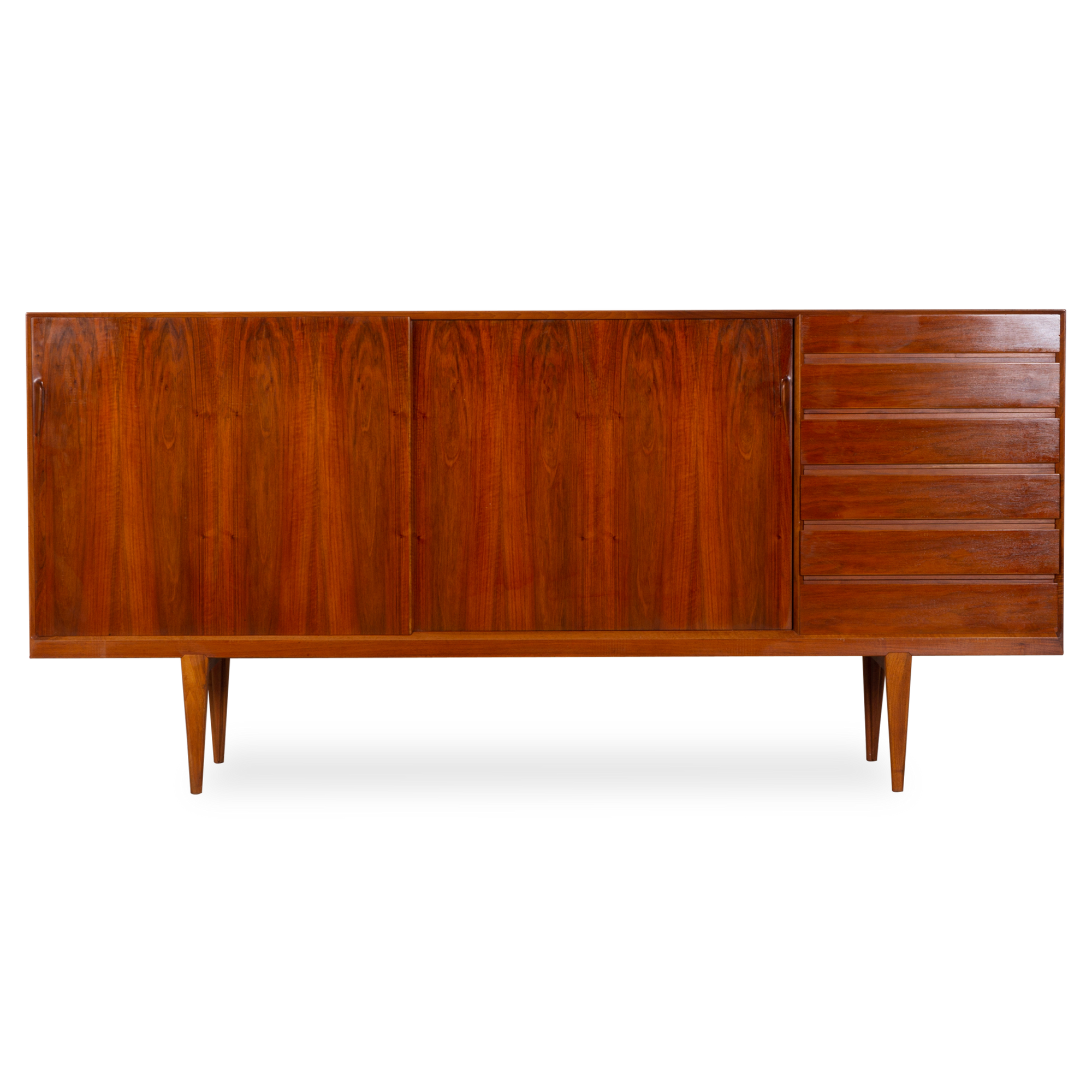 Displaying an richly aged finish, this vintage sideboard was designed by Henry Rosengren Hansen and was manufactured by Brande Mobelindustri, circa 1960s.