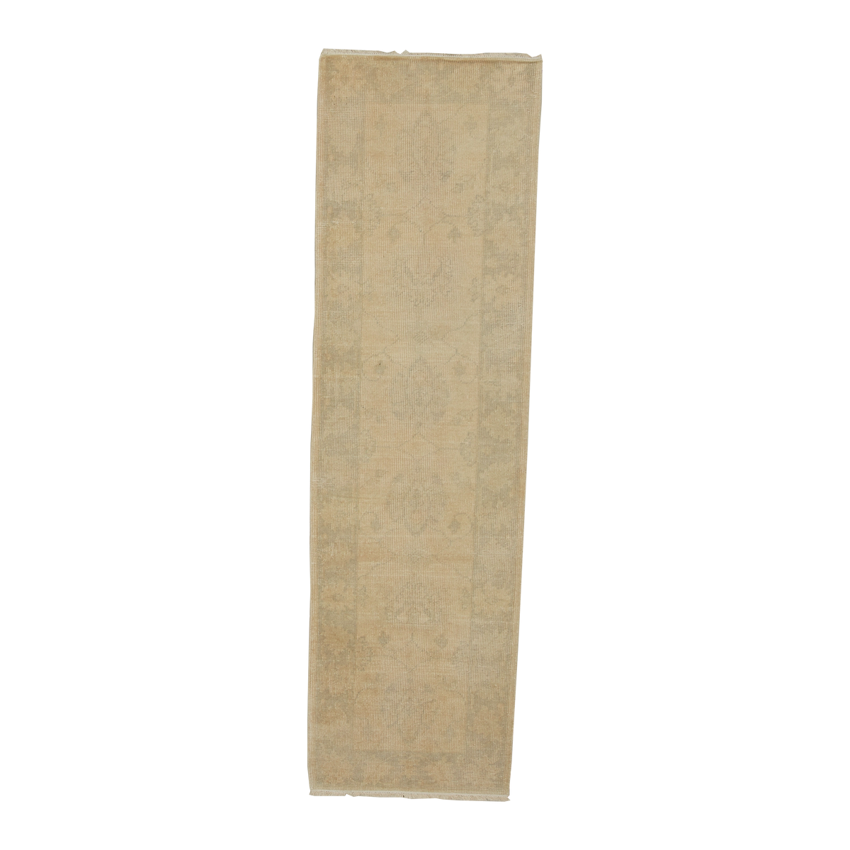 A long, narrow beige runner rug with a faded traditional floral pattern, shown flat against a solid white background.