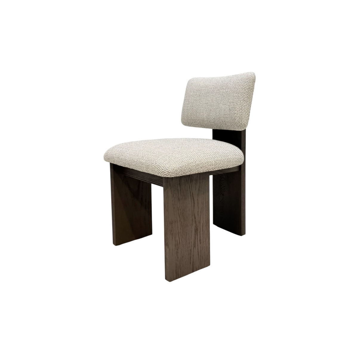 Giussano Dining Chair in an angled front view with ivory bouclé seat and back cushions set on a substantial dark wood frame.