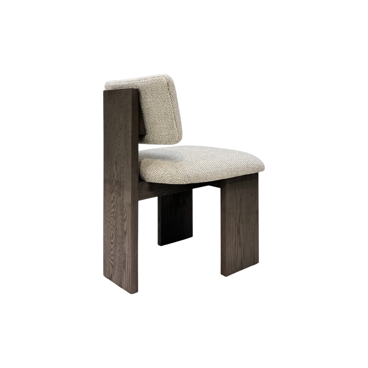 Giussano Dining Chair shown from a rear angled view, highlighting the upholstered ivory bouclé backrest and architectural dark wood frame.