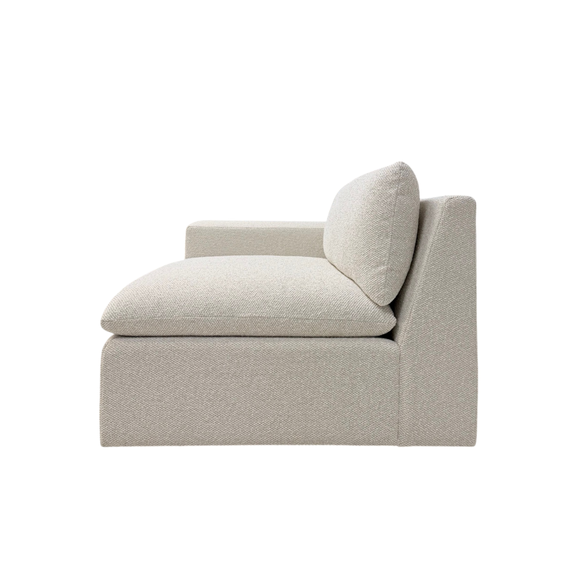 Tempo Modular LAF Chair side view highlighting the deep oversized seat cushion, loose back cushion, left arm, and softly textured ivory upholstery.