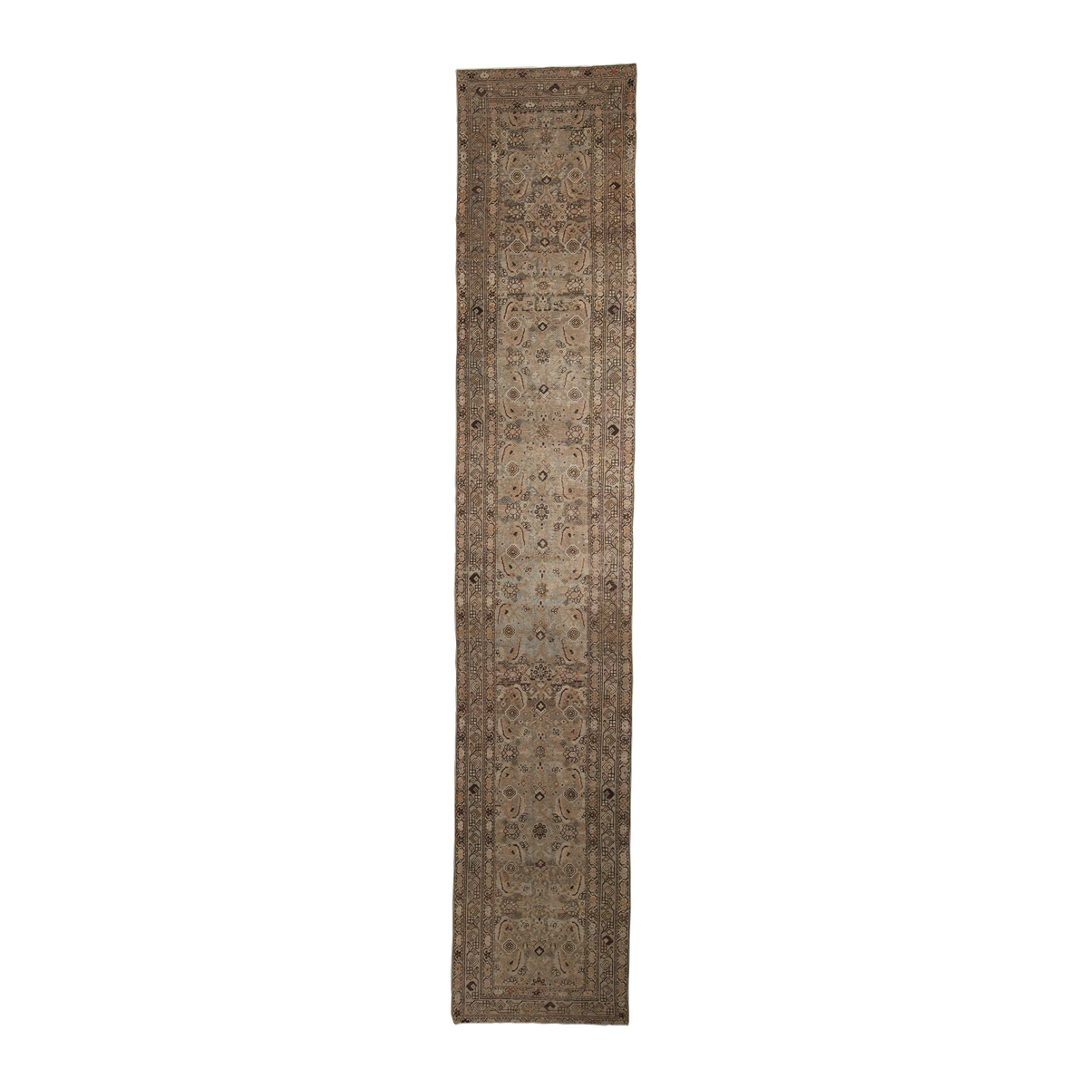 A long, narrow traditional runner rug with an intricate floral and geometric pattern in muted beige, brown, and gray tones, shown flat against a solid white background.