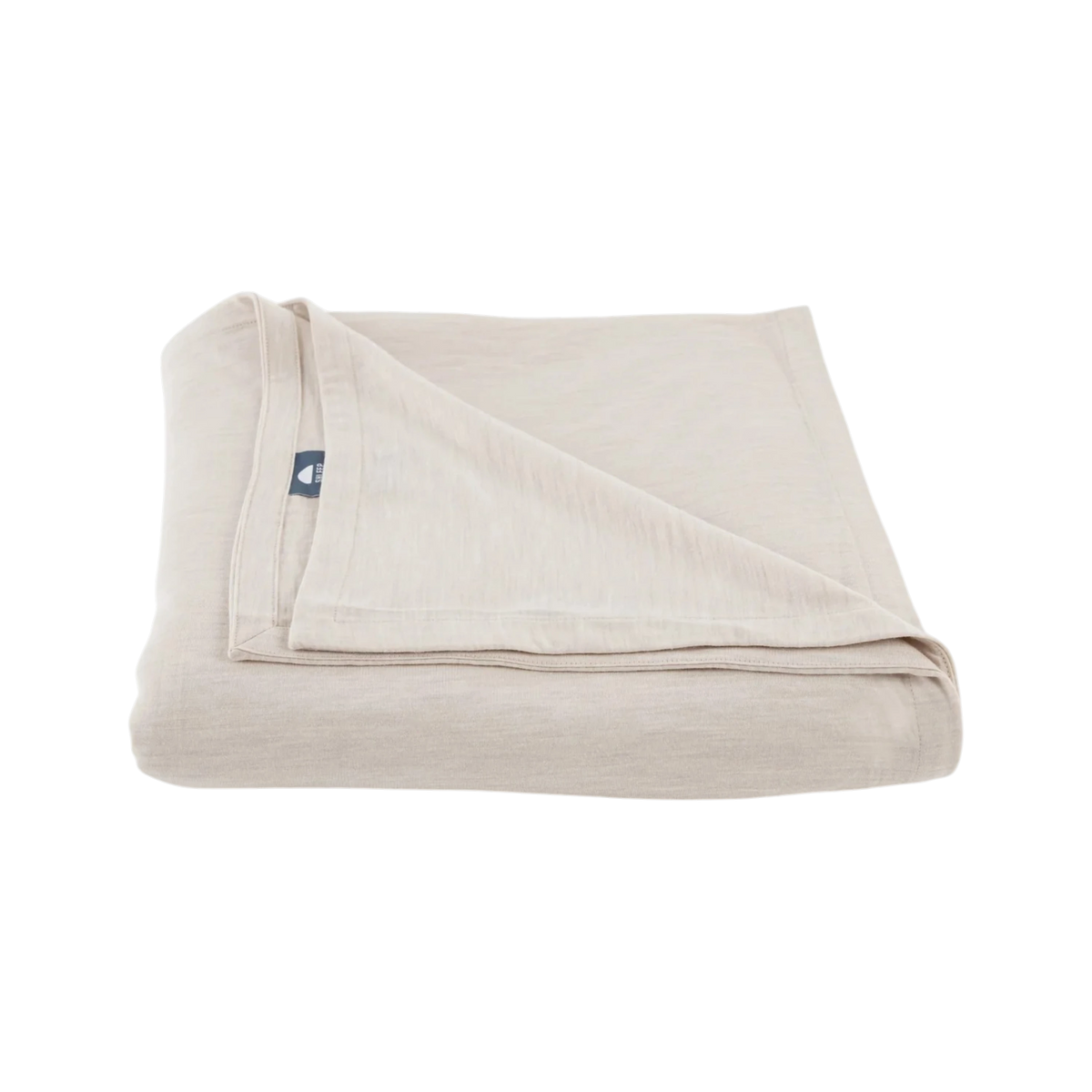 Merino Flat Sheet Queen in Ivory Merino Jersey, folded to show the soft drape, double-layered top edge and stitched finish.