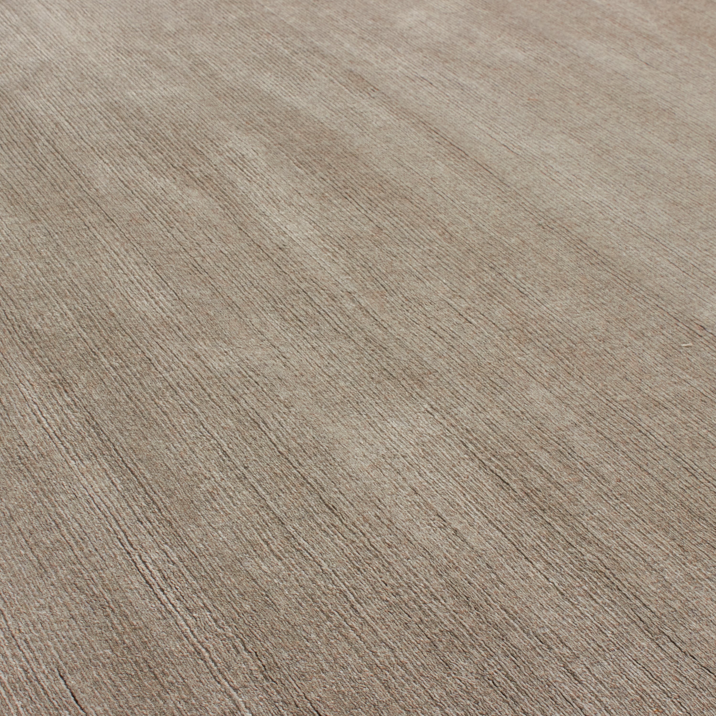 Through intricate weaves, knotting techniques and the use of colour, Elte's Solid and Textured rugs add warmth and depth to a space.
