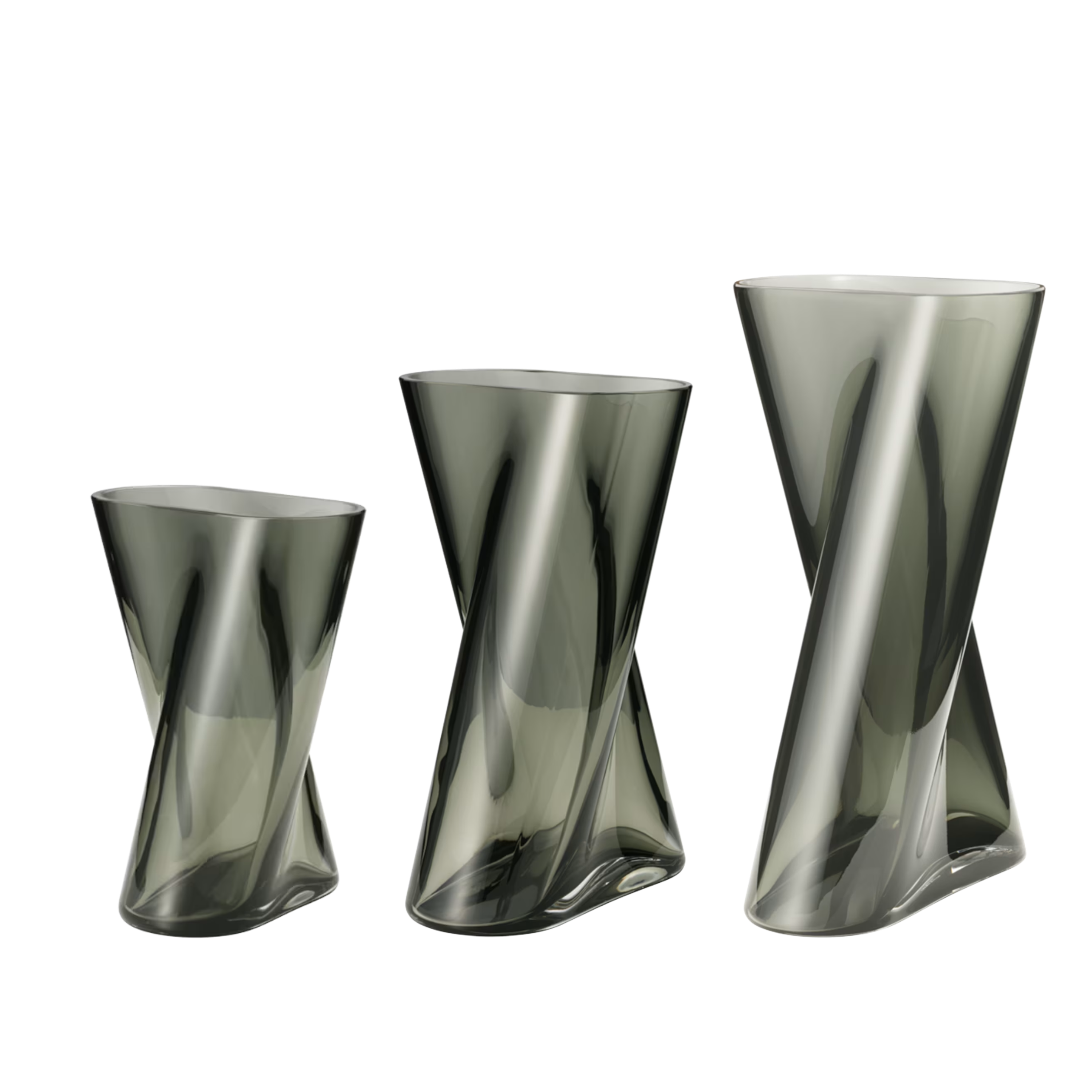Small, medium and large Lituus Vases in smoky glass, shown together with sculptural hourglass silhouettes, twisted tapering sides and softly asymmetrical mouth-blown forms.