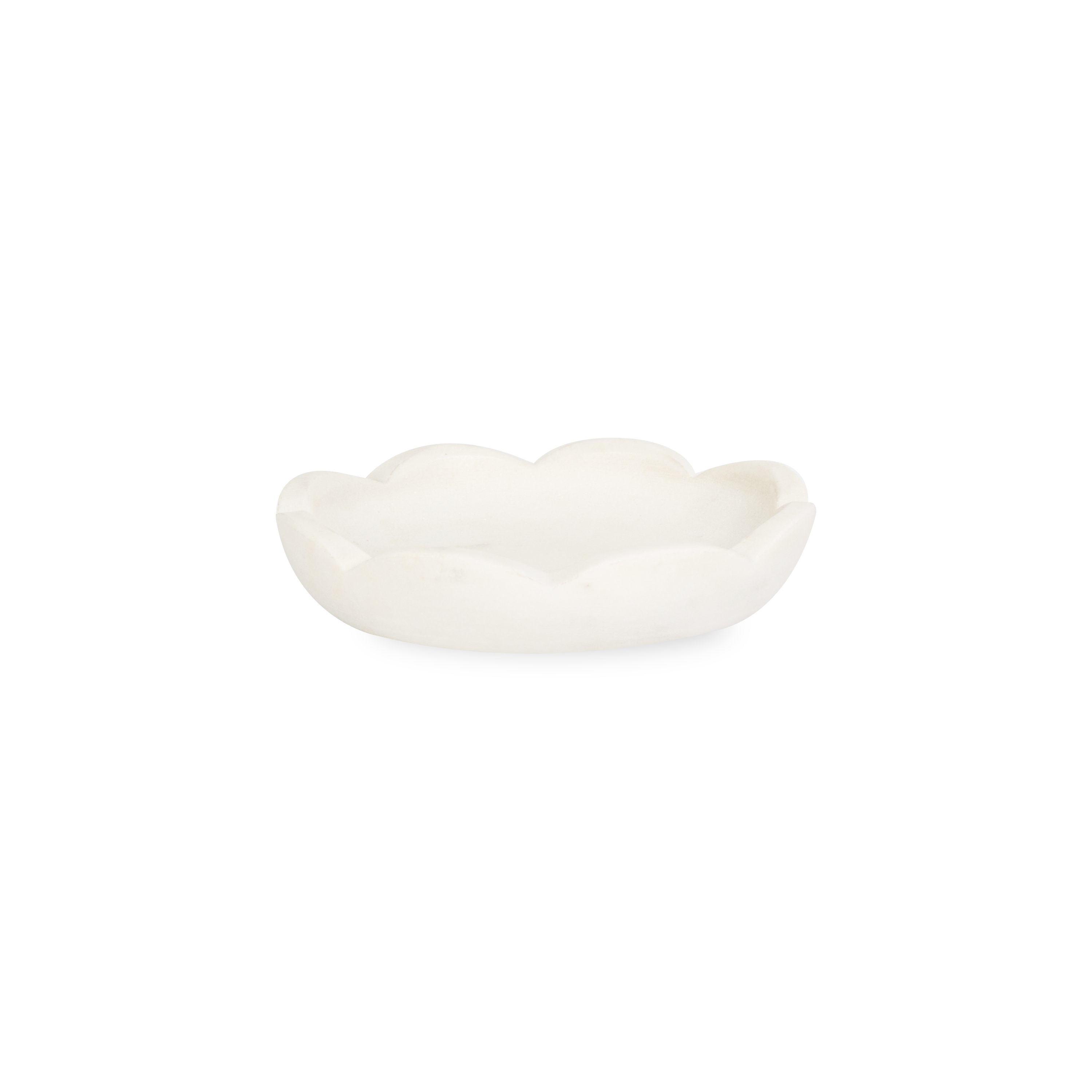 A collection of solid marble countertop pieces with a matte finish.