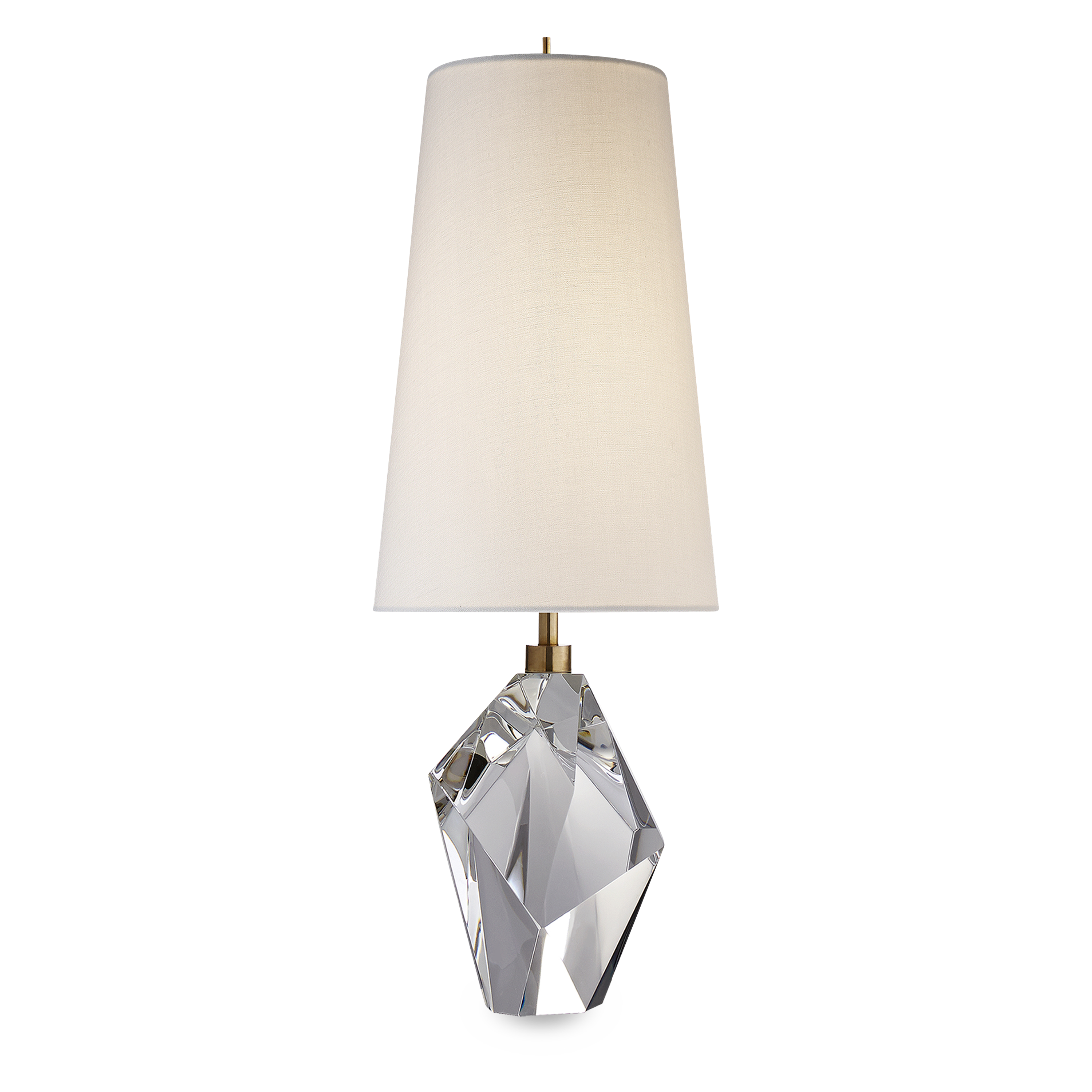 The stunning Halcyon lamp features a slender linen shade atop a spectacular crystal base which reflects light at all angles and has an undeniably radiant quality.