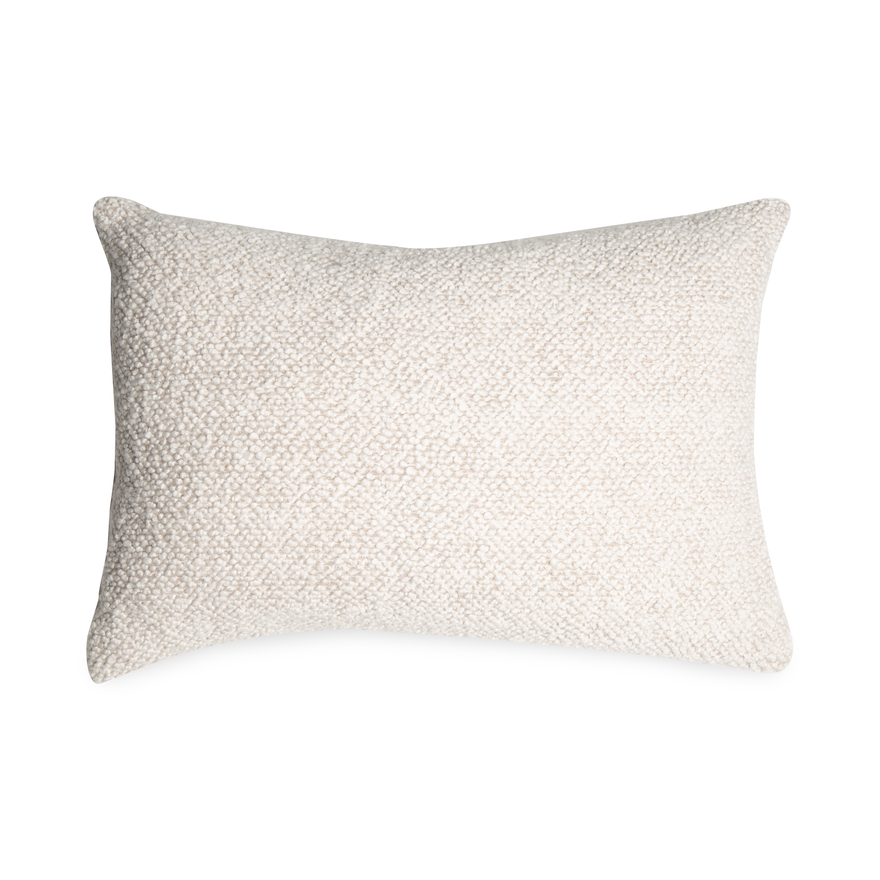 The Tasmin pillow features a plush texture and monocromatic palette.