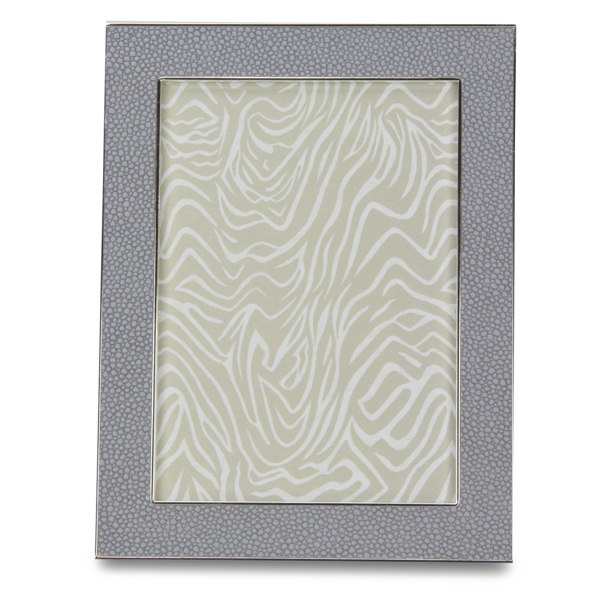 A gorgeous grey faux shagreen picture frame capable of blending in with various décor styles.