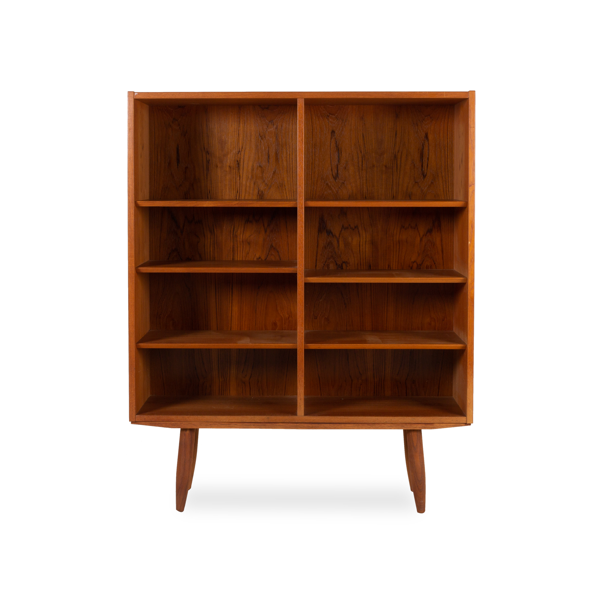 A stunning display of aged wood, this vintage bookcase was designed by  Poul Hundevad and produced by Hundevad Mobelfabrik, Denmark.